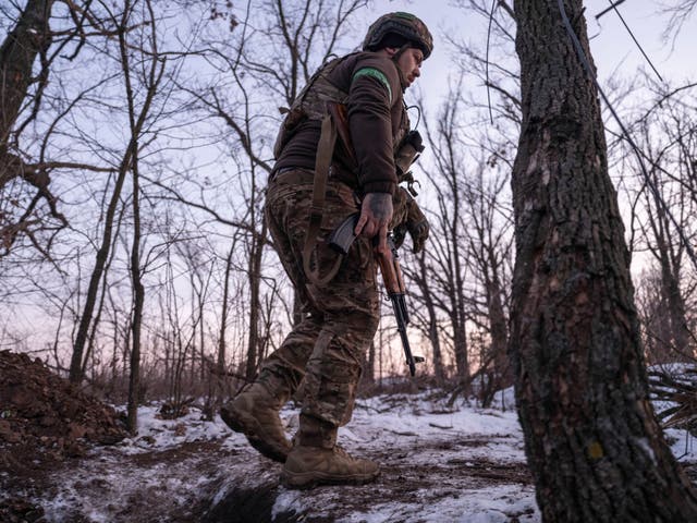 <p>A Ukrainian soldier on patrol in partially occupied Toretsk, the site of heavy battles with the Russian troops in Ukraine’s Donetsk region, on 22 February</p>