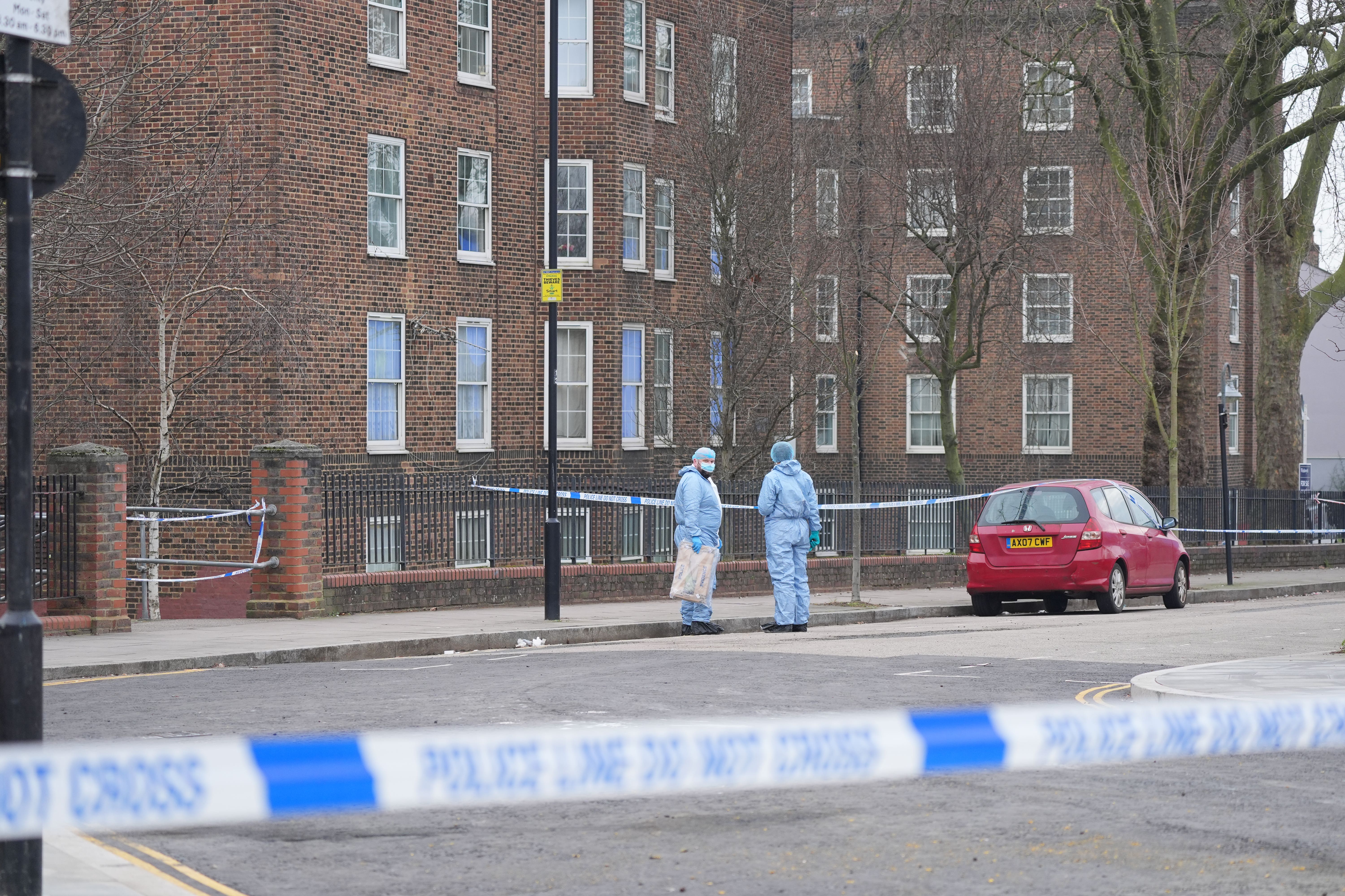 Police at the scene on Bodney Road in Hackney (Yui Mok/PA)