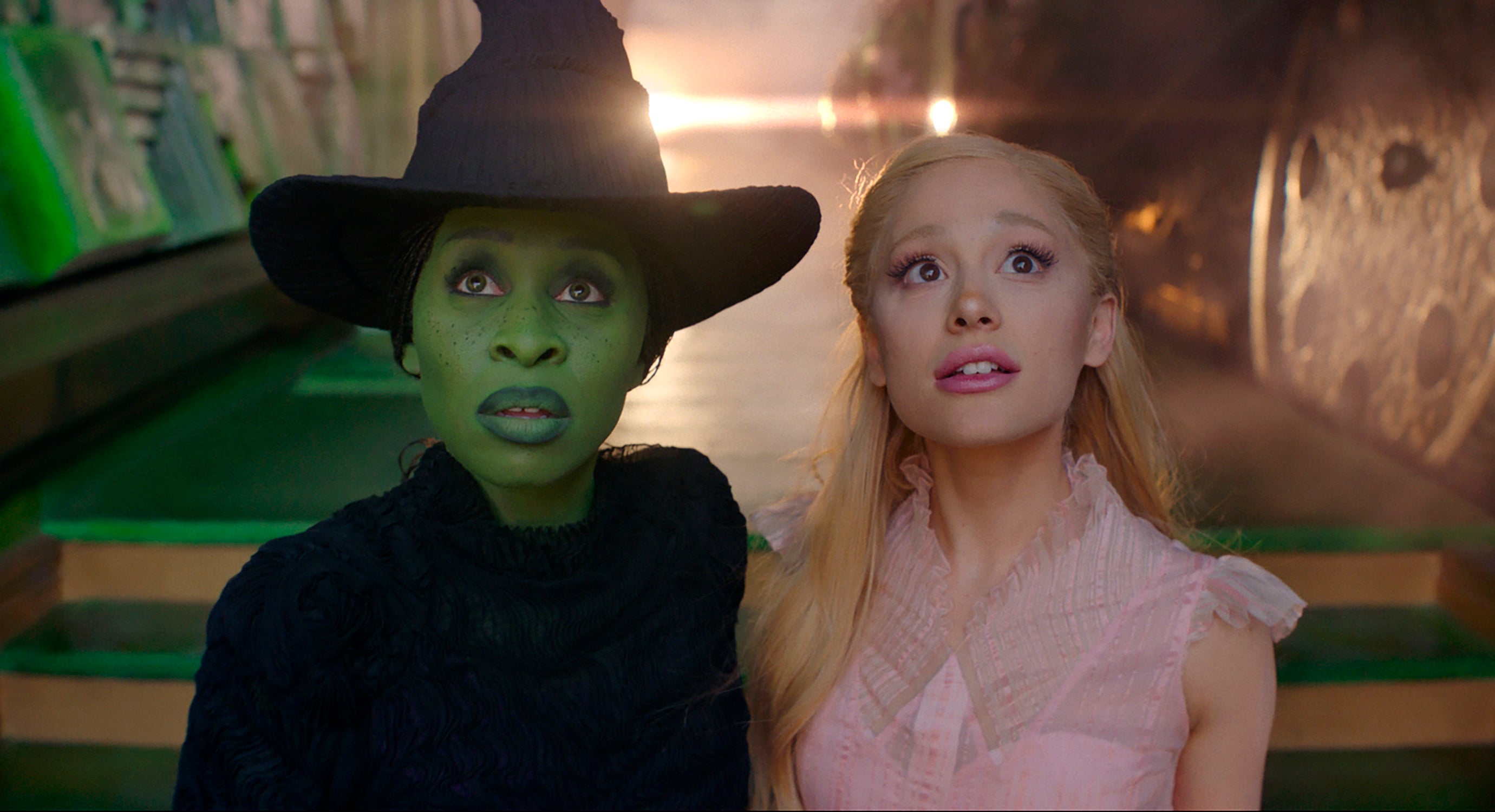 Cynthia Erivo (left) as Elphaba and Ariana Grande (right) as Glinda in ‘Wicked’