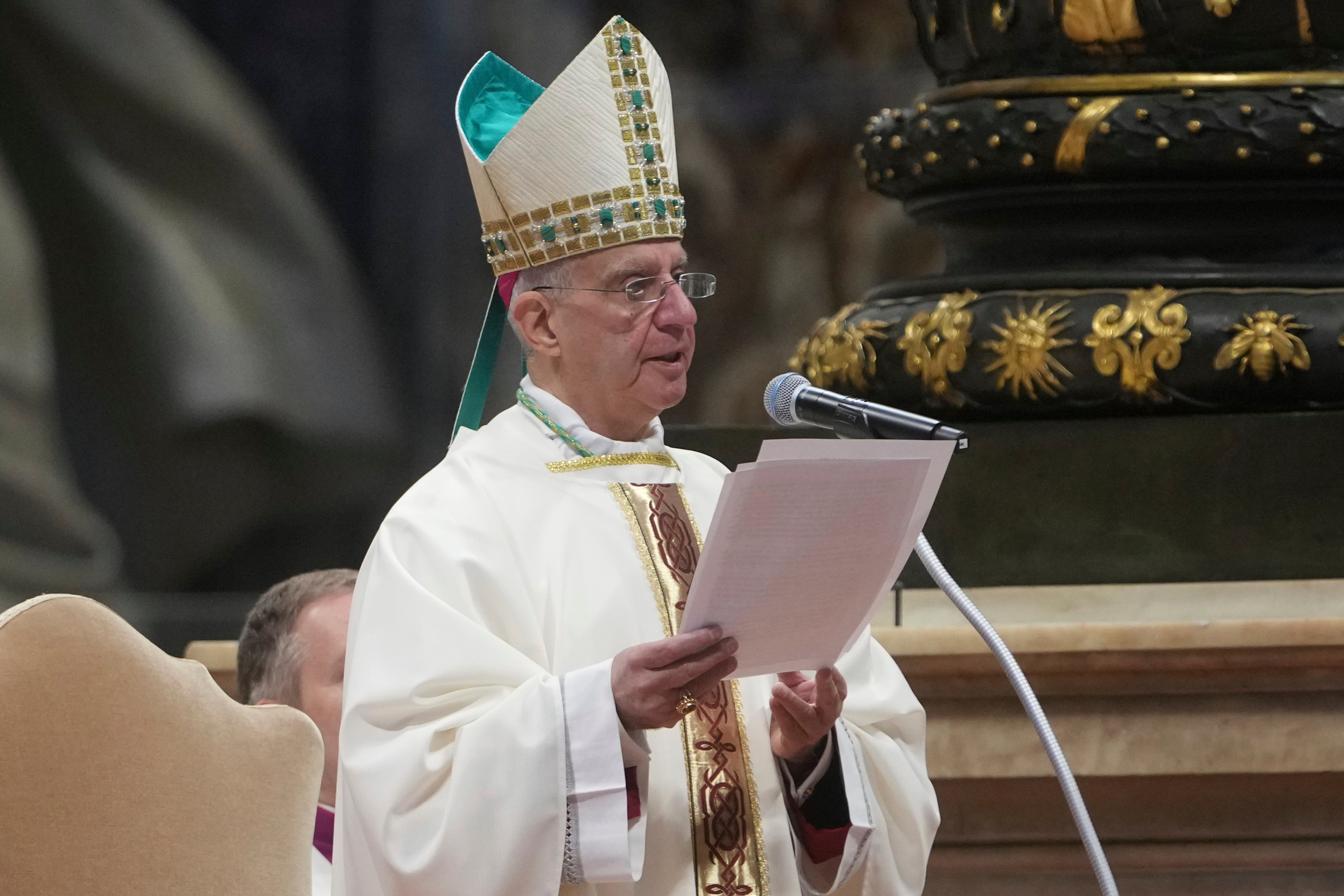 Archbishop Rino Fisichella reads the homily written by Pope Francis during a mass for the Jubilee of Deacons on Sunday