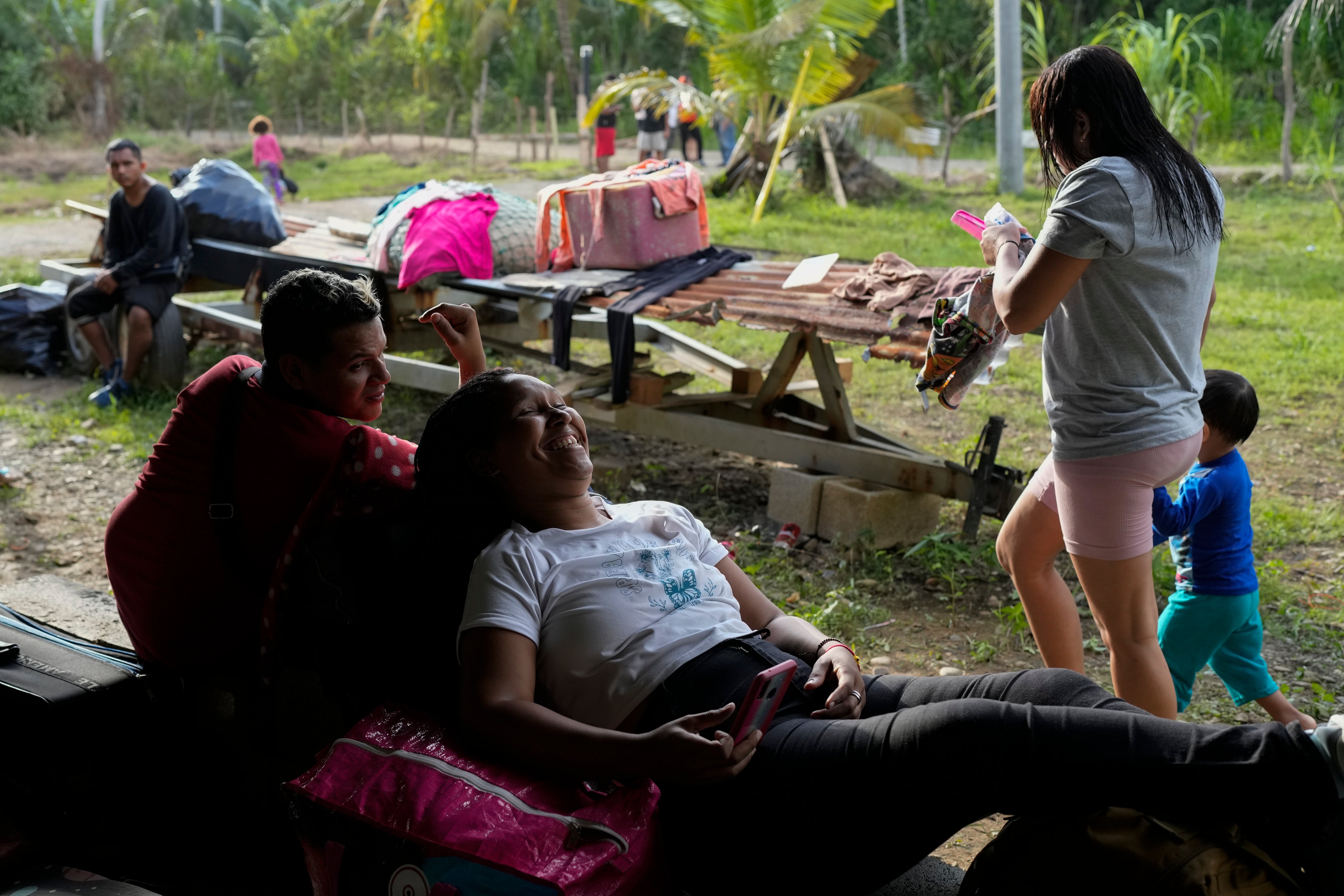 Karla Castillo rests with other migrants on Panama’s Caribbean coast