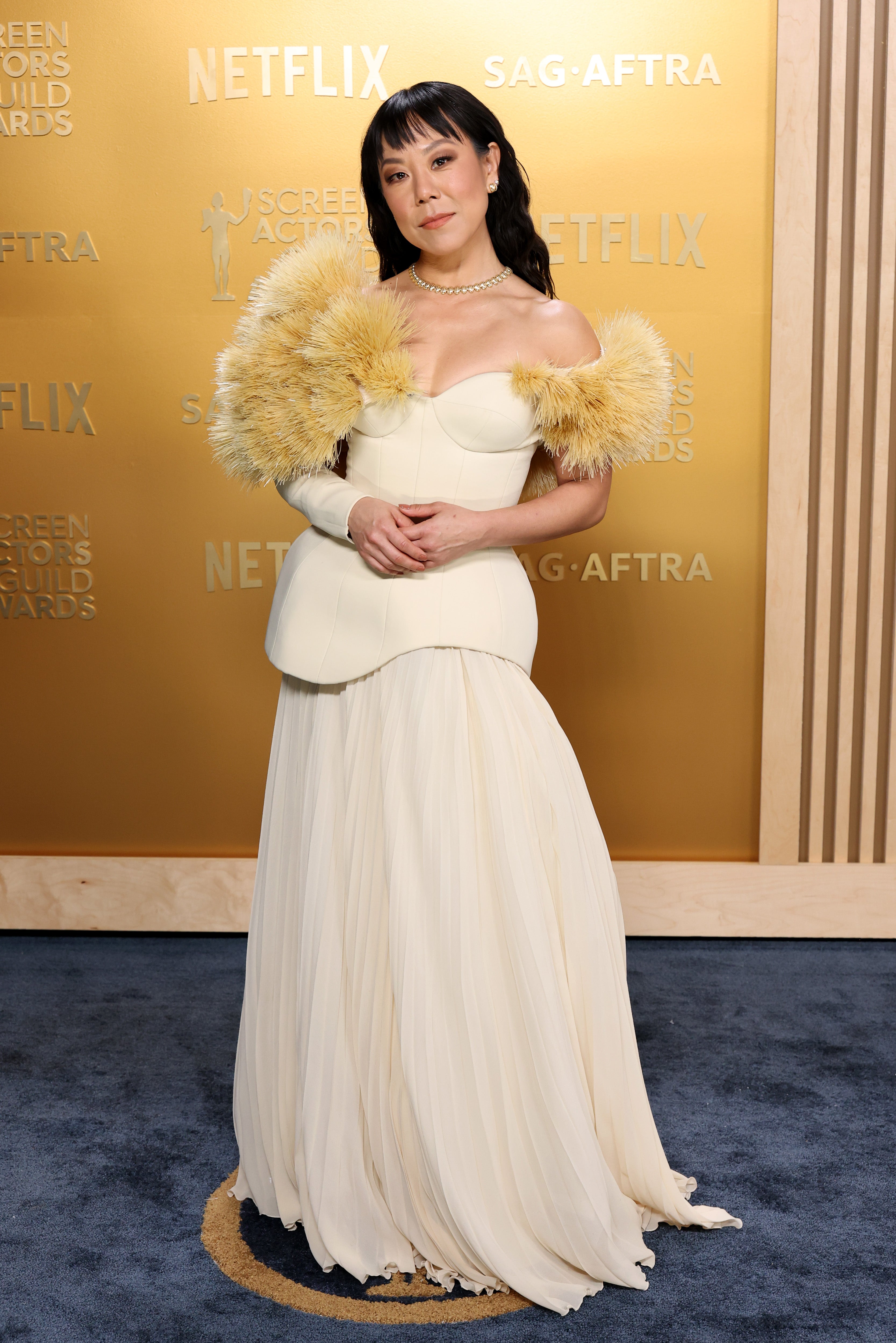 Ahn wore a strapless cream-colored top and matching skirt — but her fur proved divisive.