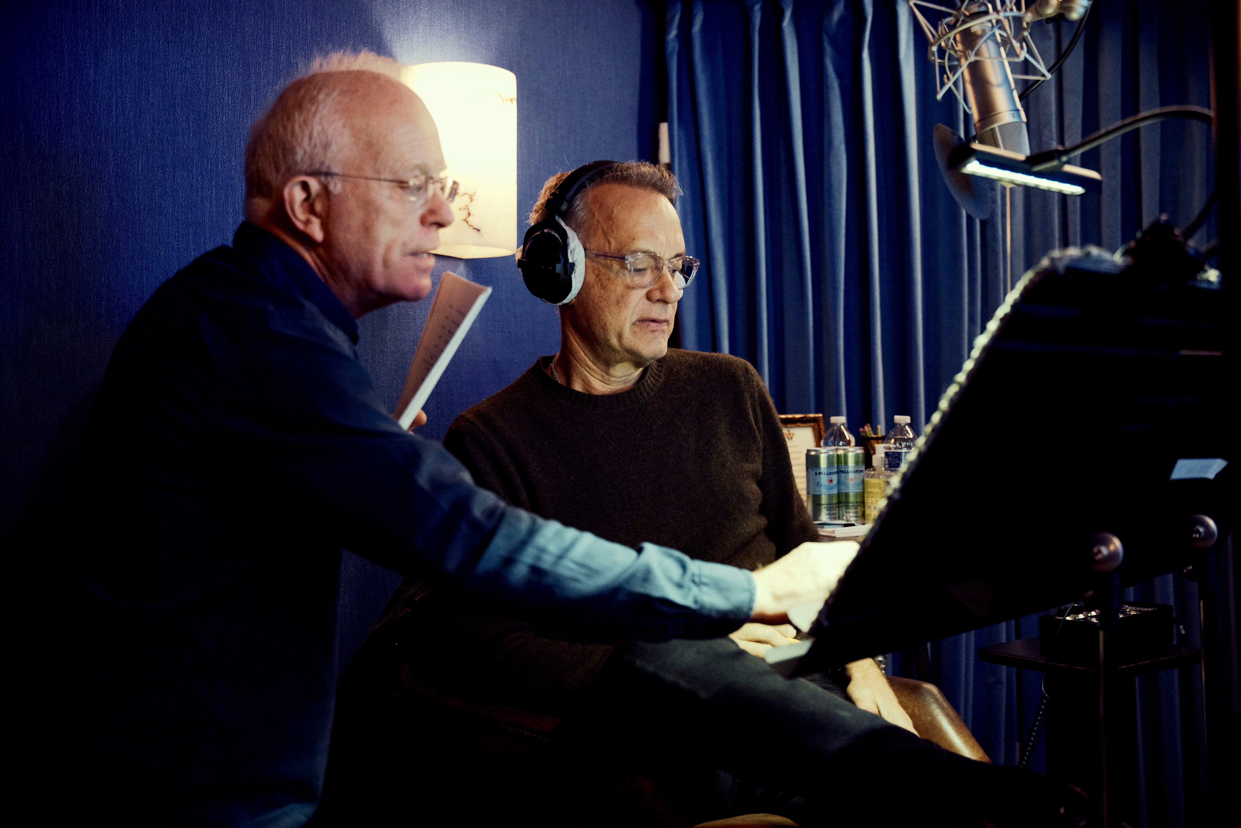 Producer Mike Gunton and Tom Hanks in the studio