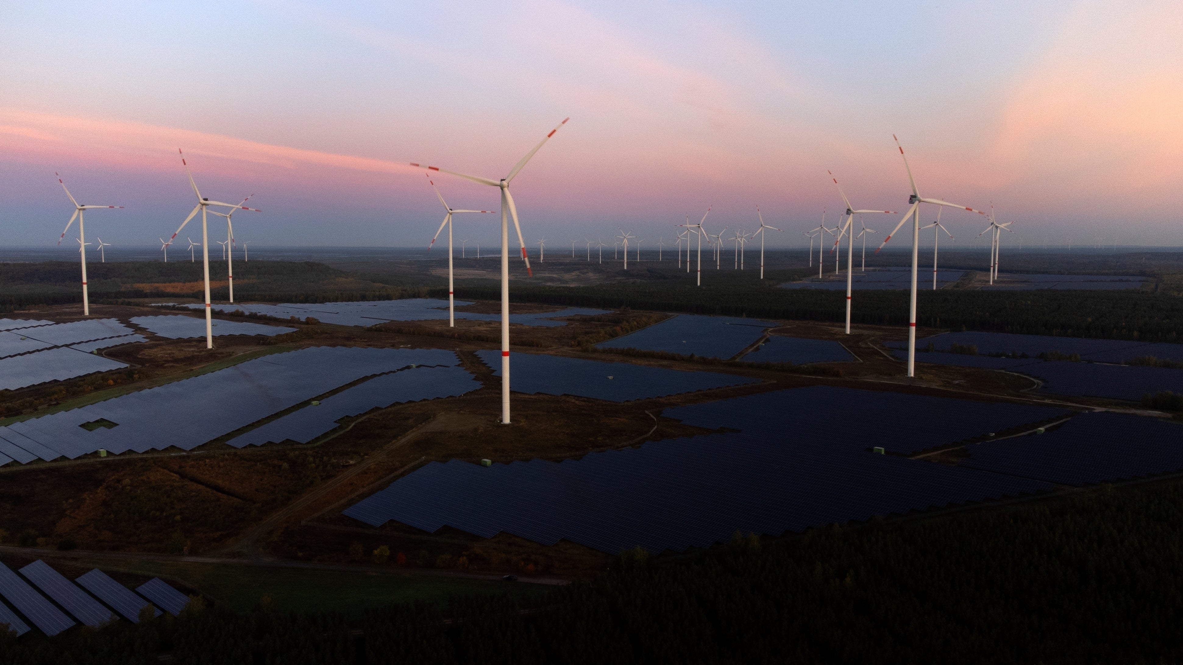 Wind turbines at a solar energy plant in Germany