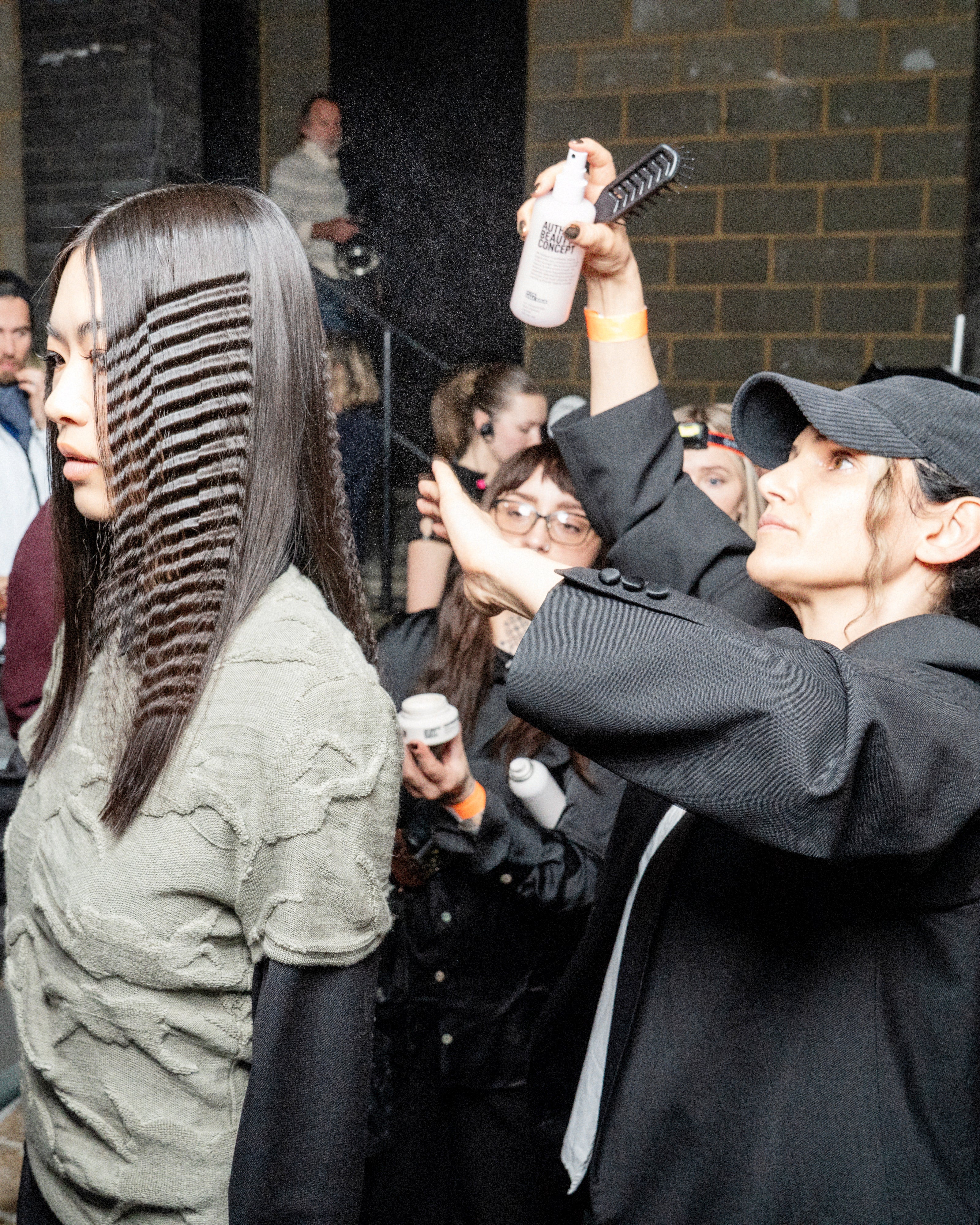 The crimping was presented alongside glossy pin-straight hair