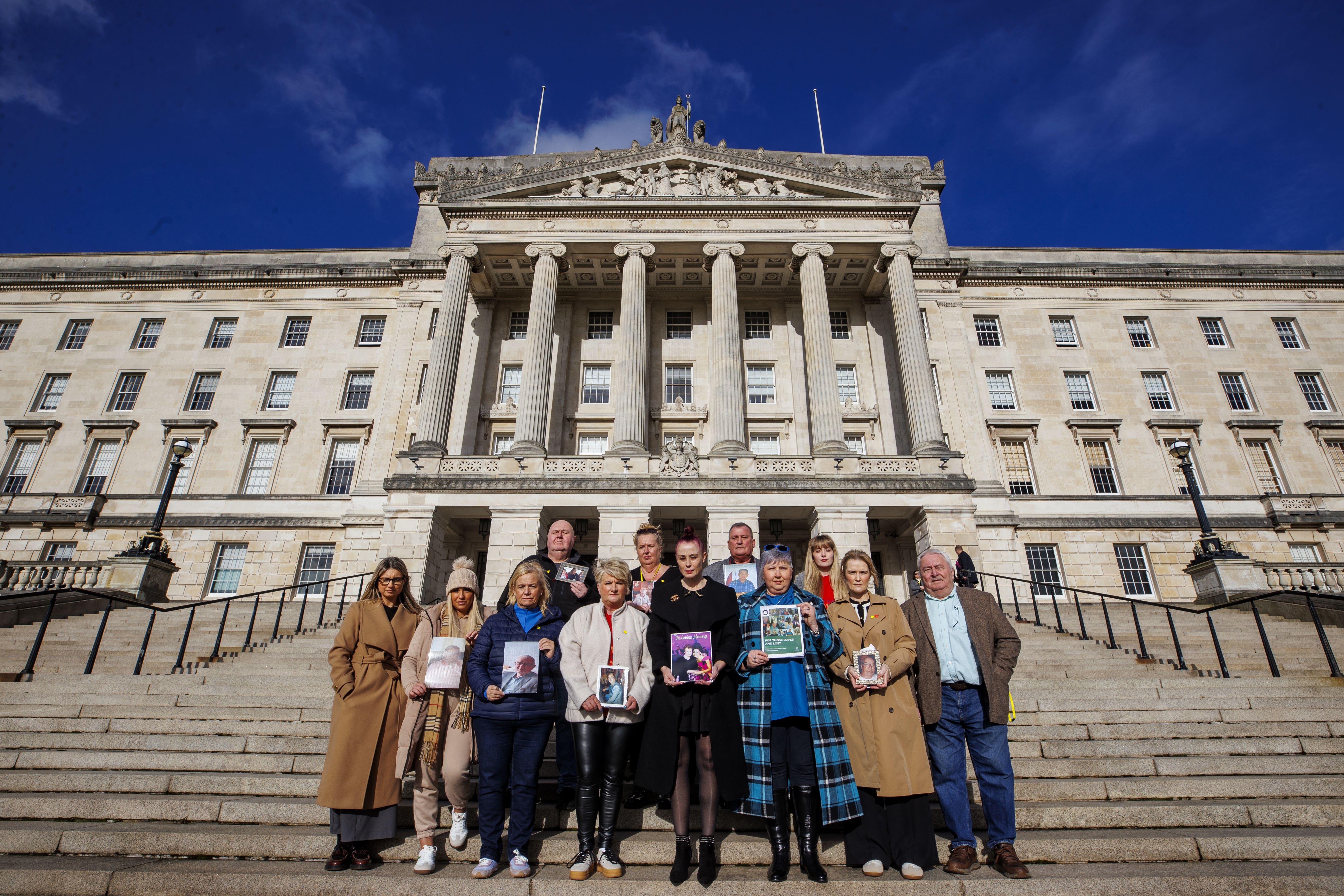 Members of the Northern Ireland Covid Bereaved Families for Justice group (Liam McBurney/PA)