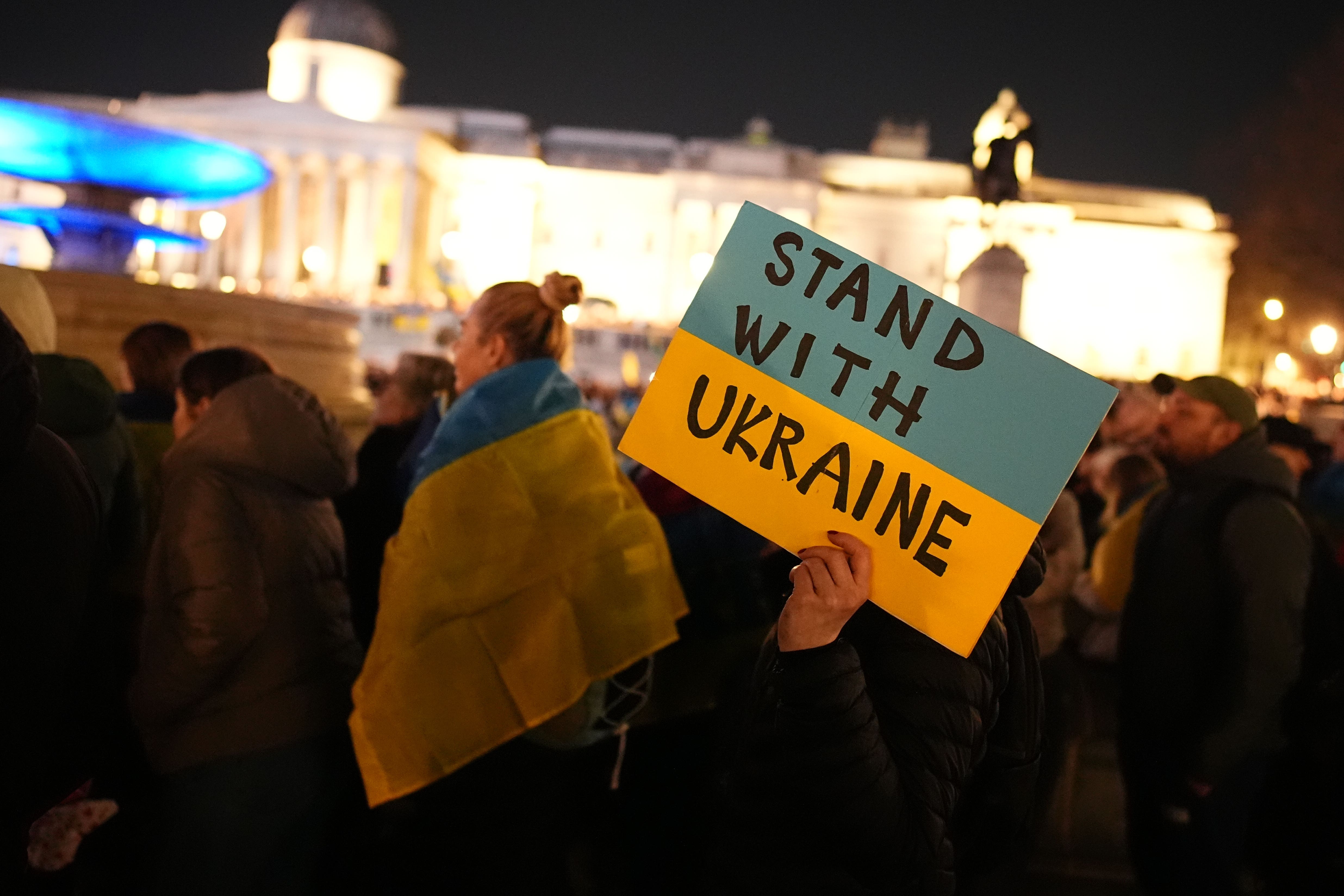 People gather in Trafalgar Square, central London, to mark the third anniversary of Russia’s invasion of Ukraine (Aaron Chown/PA)