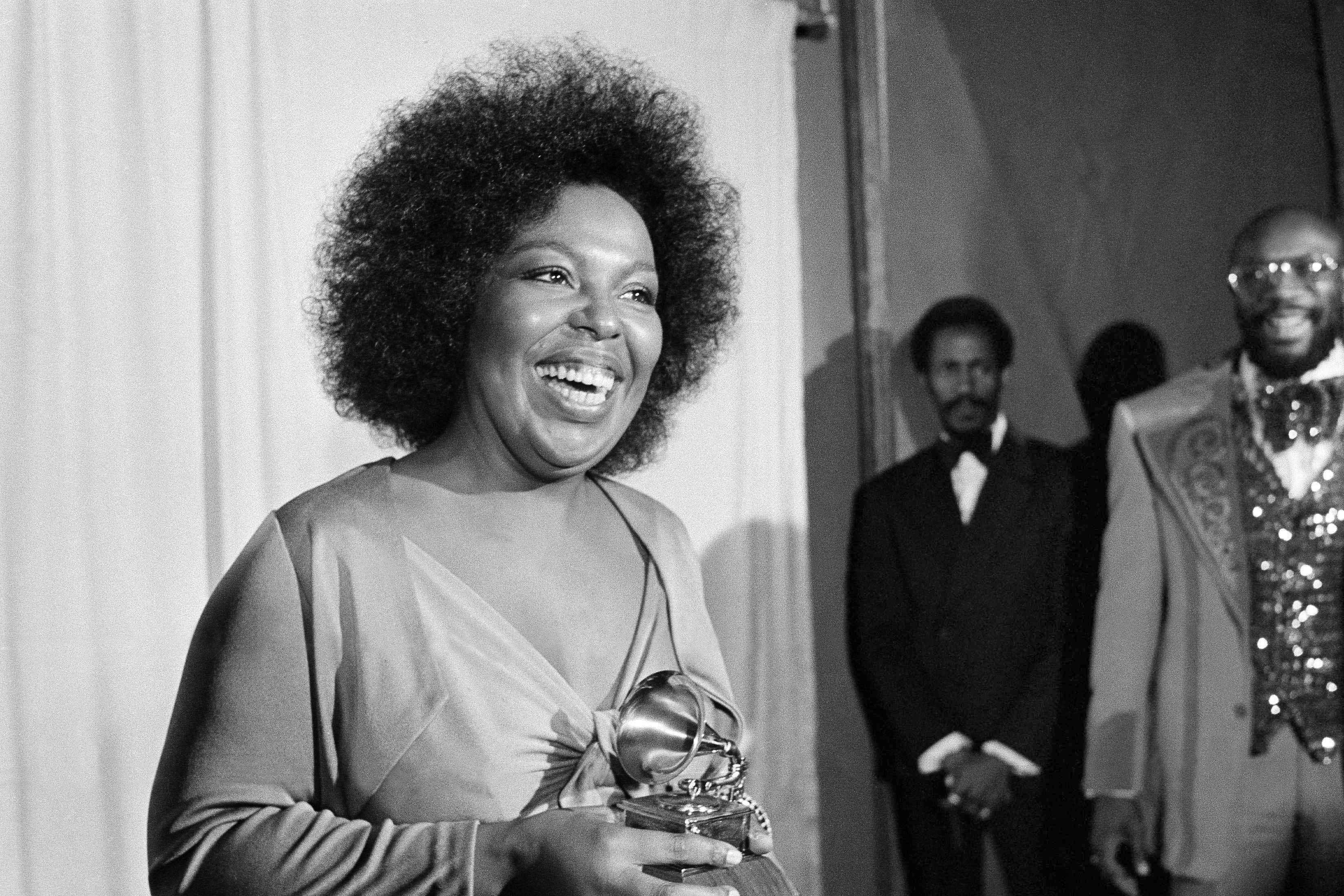 Roberta Flack holds the Grammy award for her record Killing Me Softly With His Song (Harold Filan/AP)