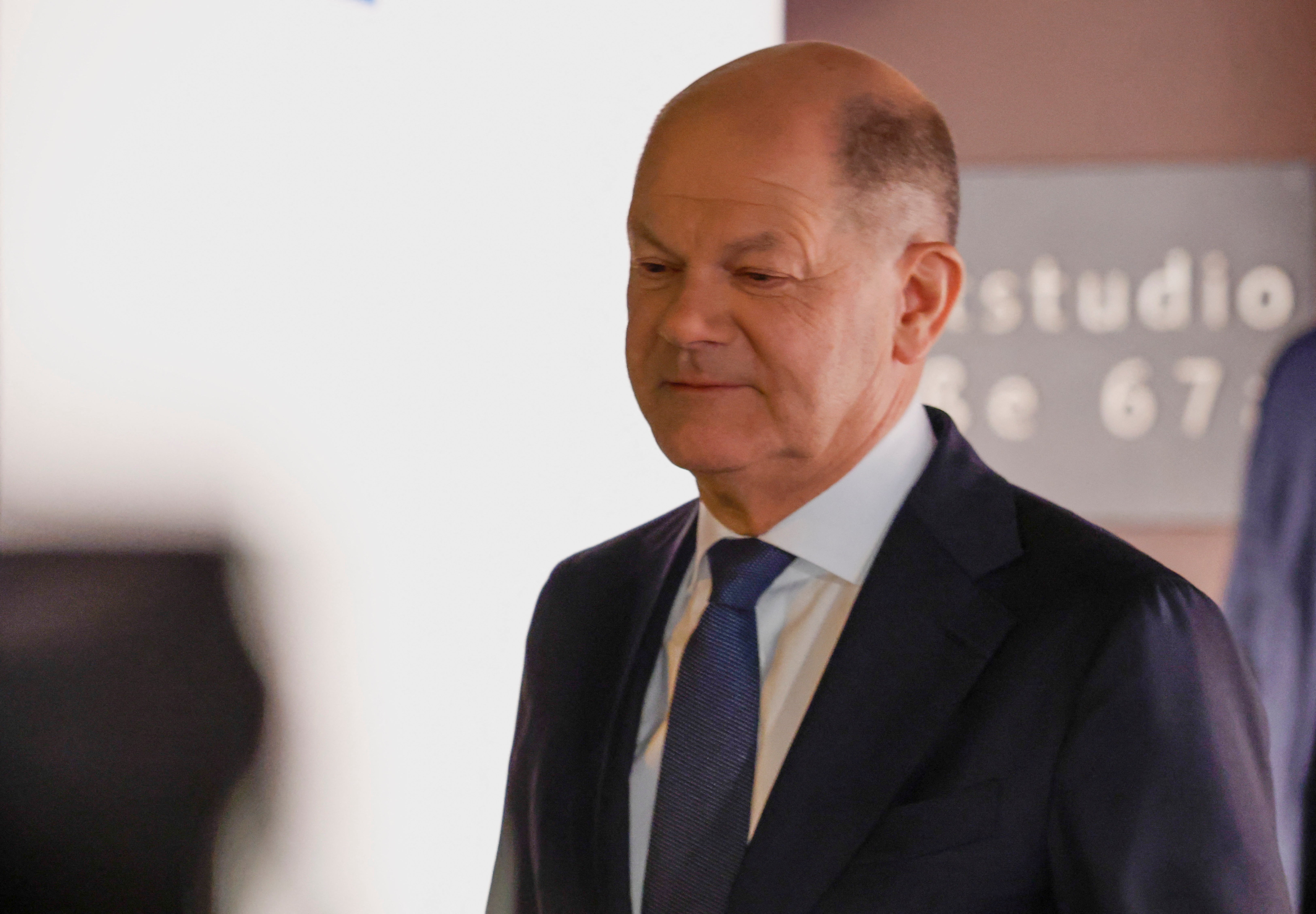 German chancellor Olaf Scholz of the Social Democratic Party leaves after a TV debate