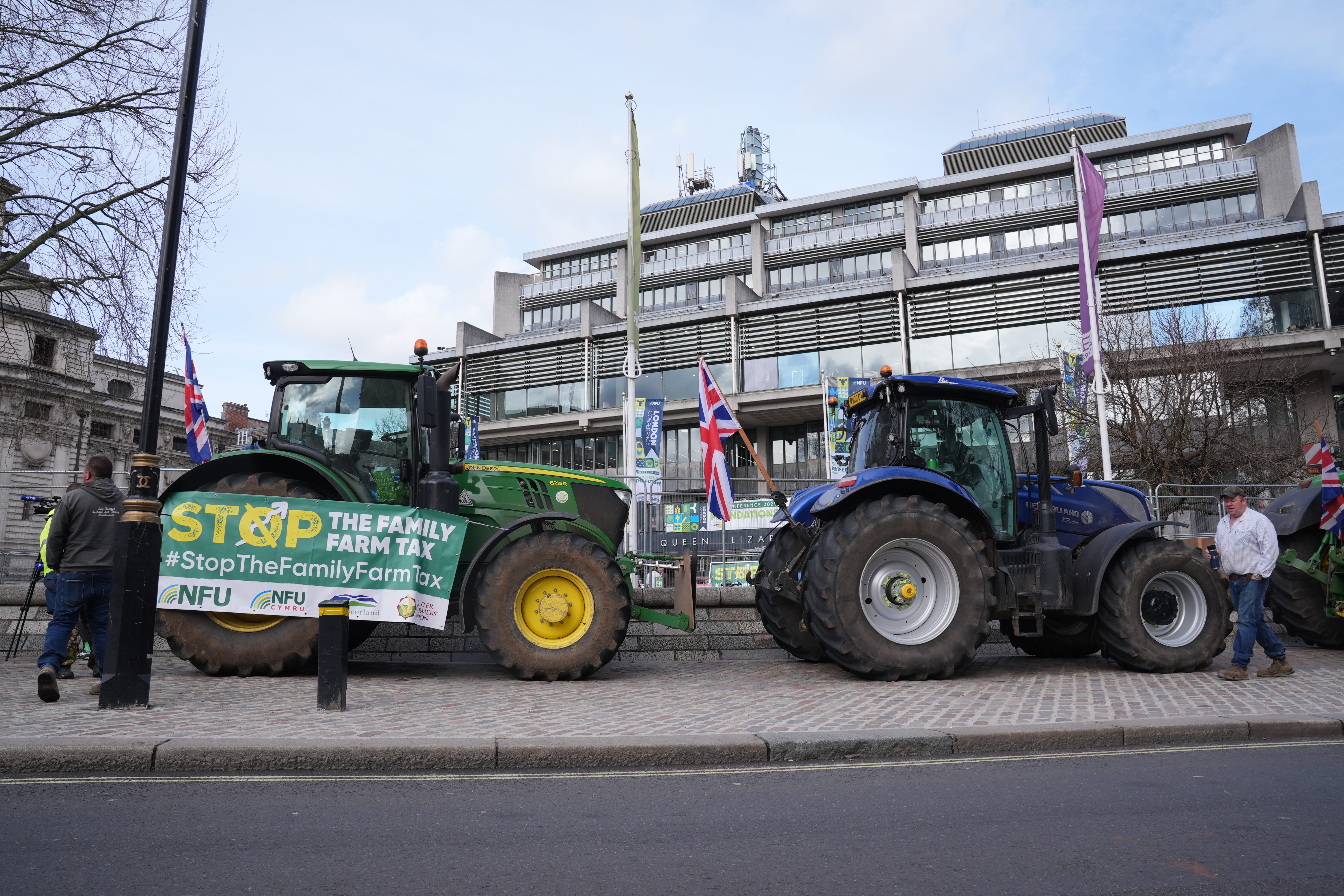 Farmers have been protesting outside the NFU conference (Lucy North/PA)