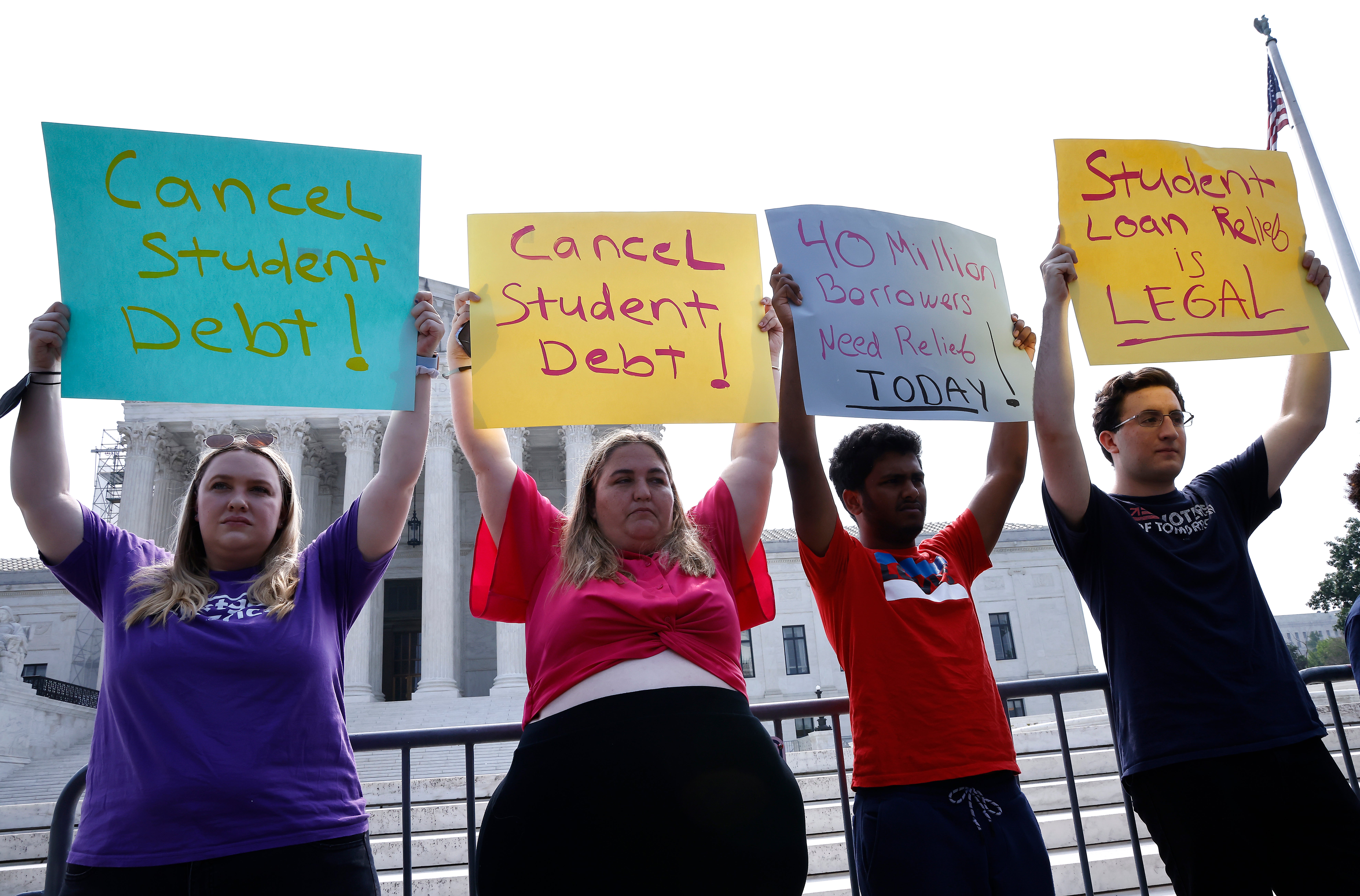 Advocates hold a demonstration outside the Supreme Court in favor of student loan cancellation. Some 5 million people will have their defaulted federal student loans sent to collections next week after a five-year reprieve