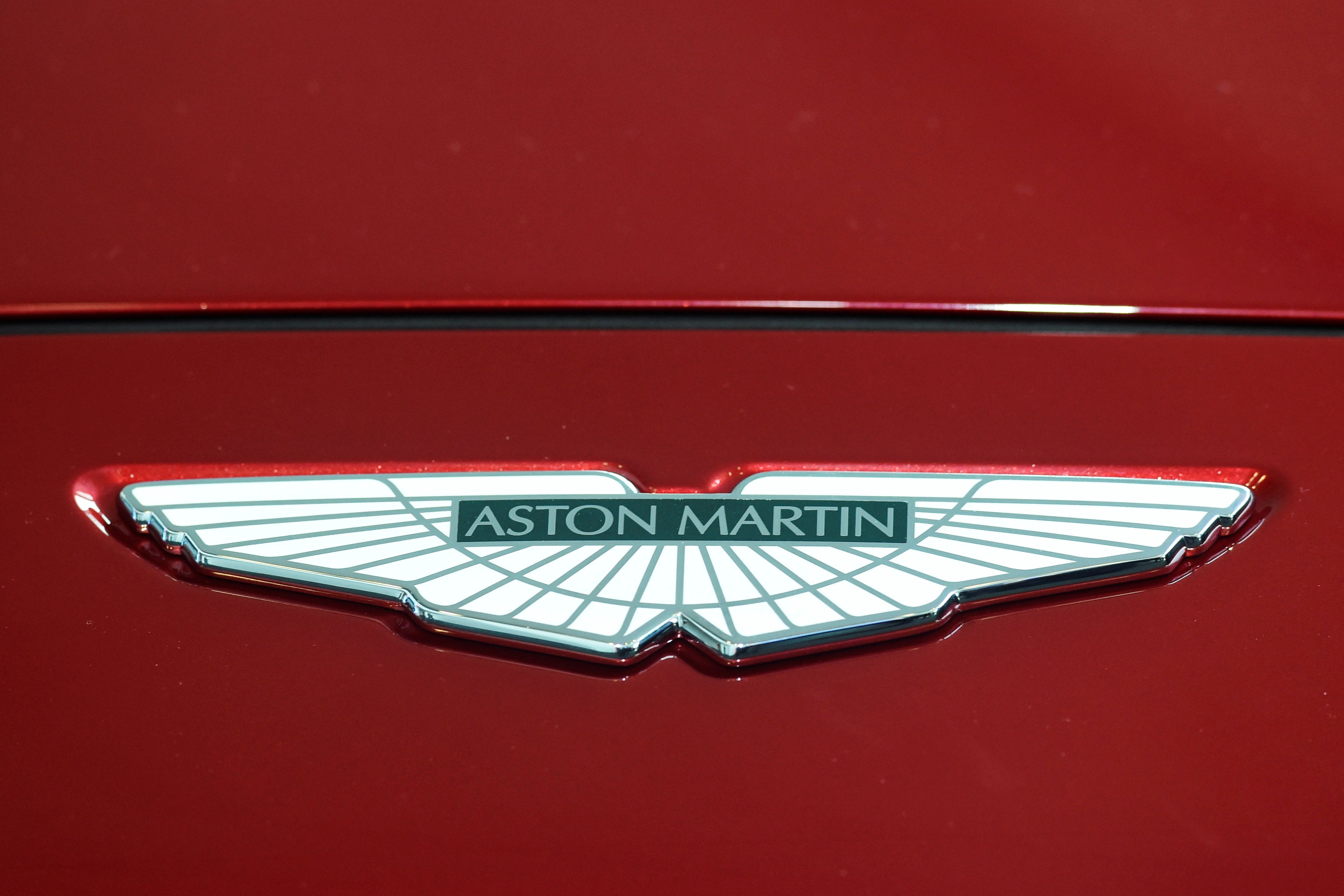 The luxury carmaker Aston Martin is slashing jobs (Rebecca Naden/PA)