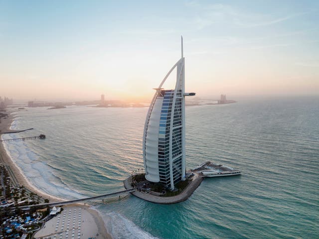 <p>The Burj Al Arab Jumeirah at sunset</p>