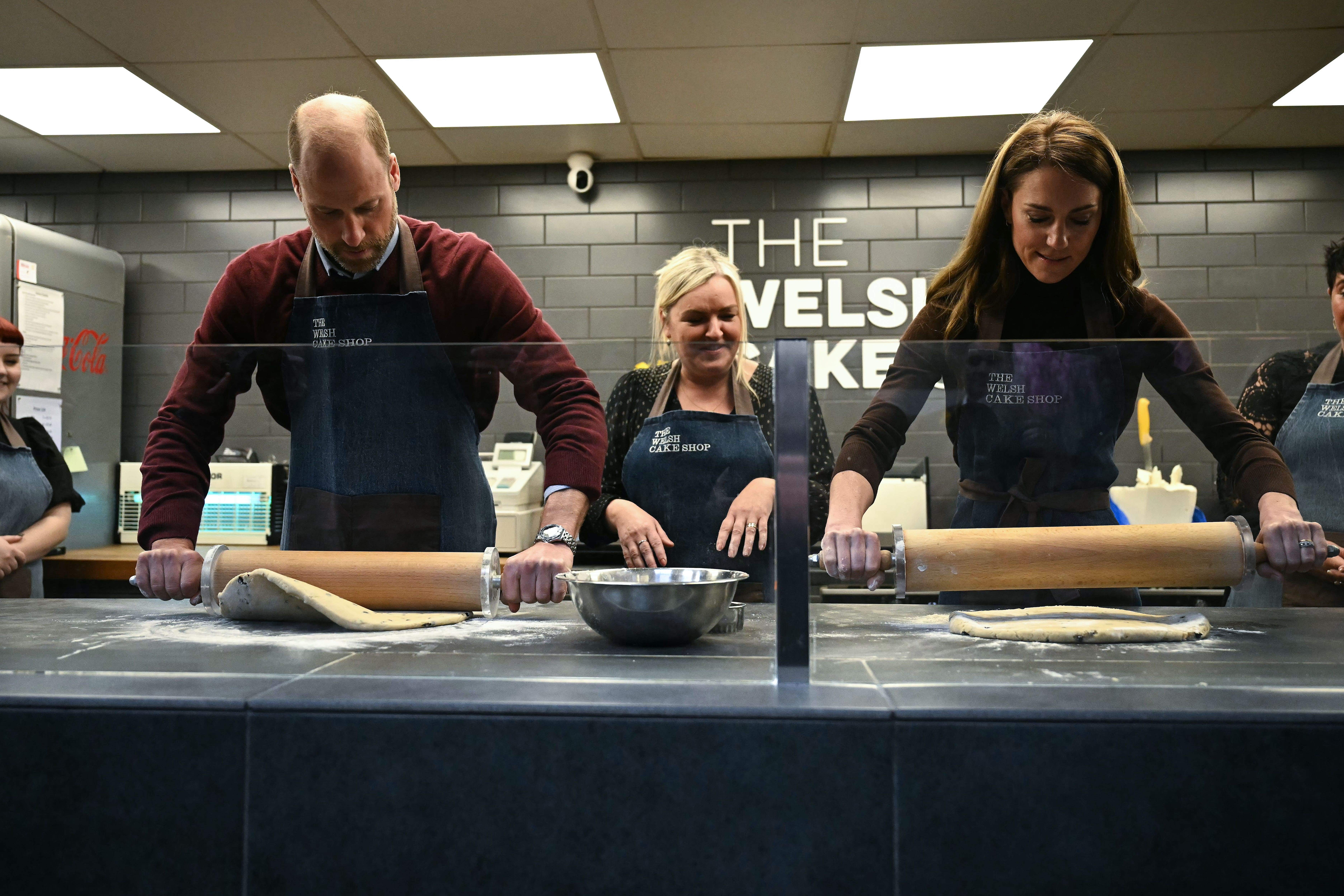 The Prince and Princess of Wales help prepare and cook a batch of Welsh cakes (Ben Stansall/PA)