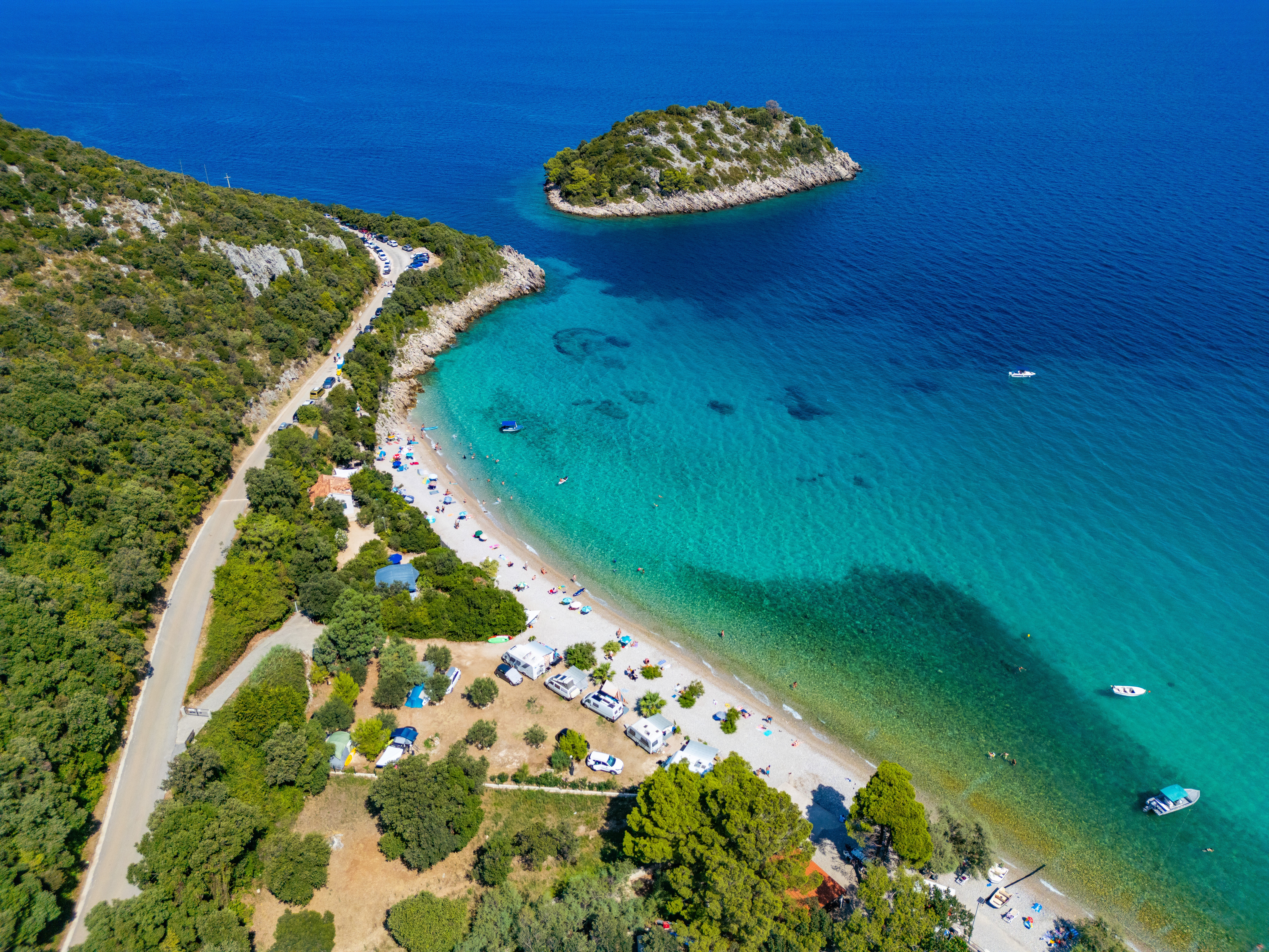 Enjoy the white sands and crystalline waters of Divna beach in the Pelješac Peninsula