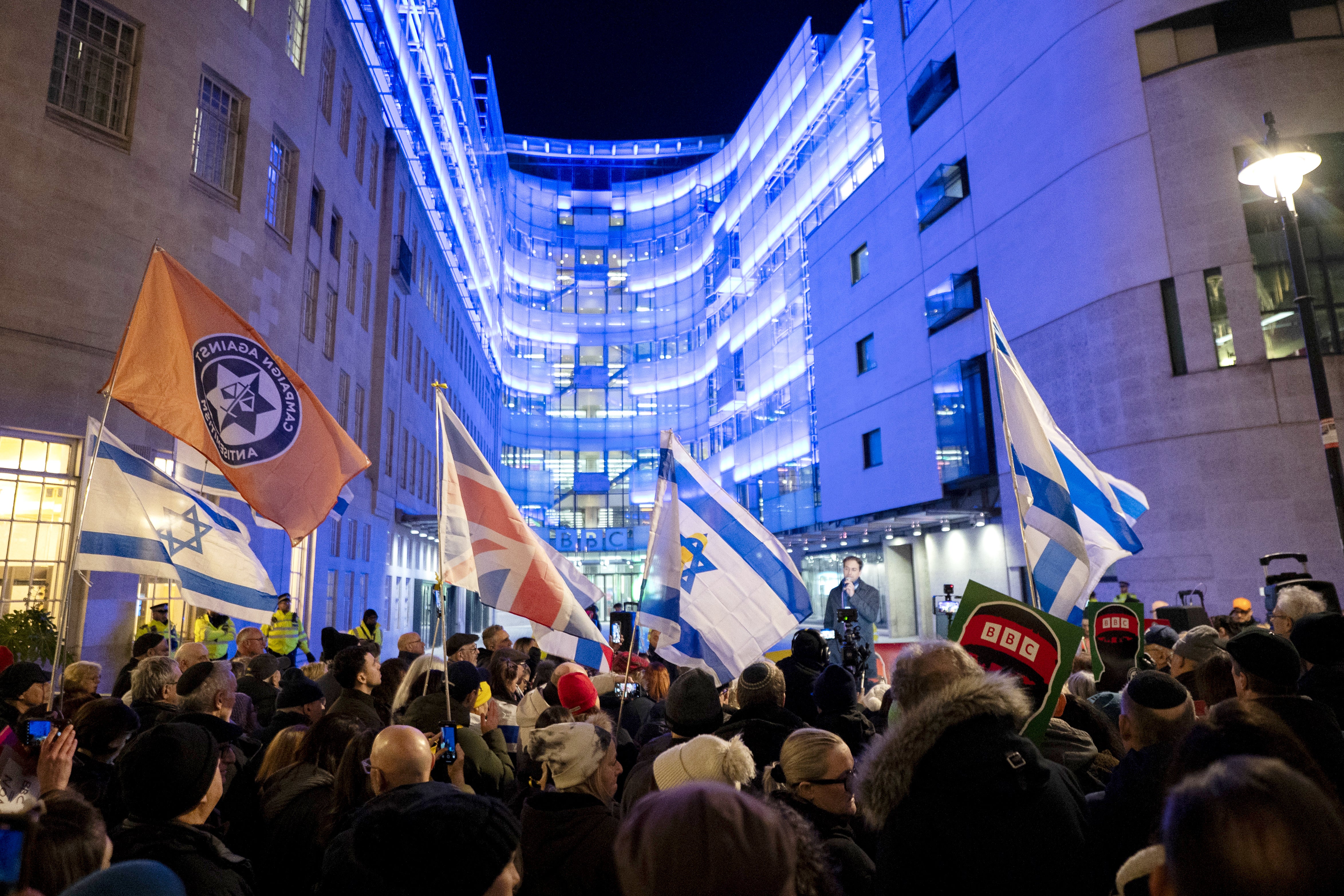 People take part in a protest outside Broadcasting House organised by the Campaign Against Antisemitism over the documentary