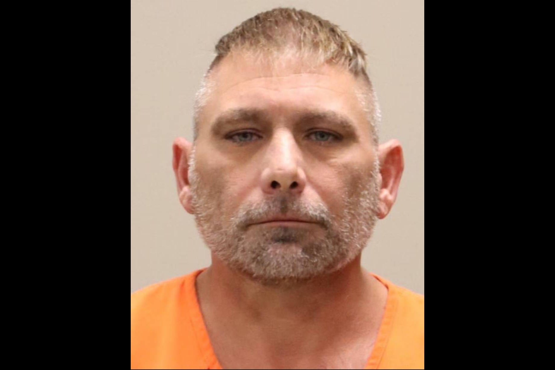 Mark Swick, 47, has been arrested on two counts of battery after allegedly assaulting an elderly couple last month