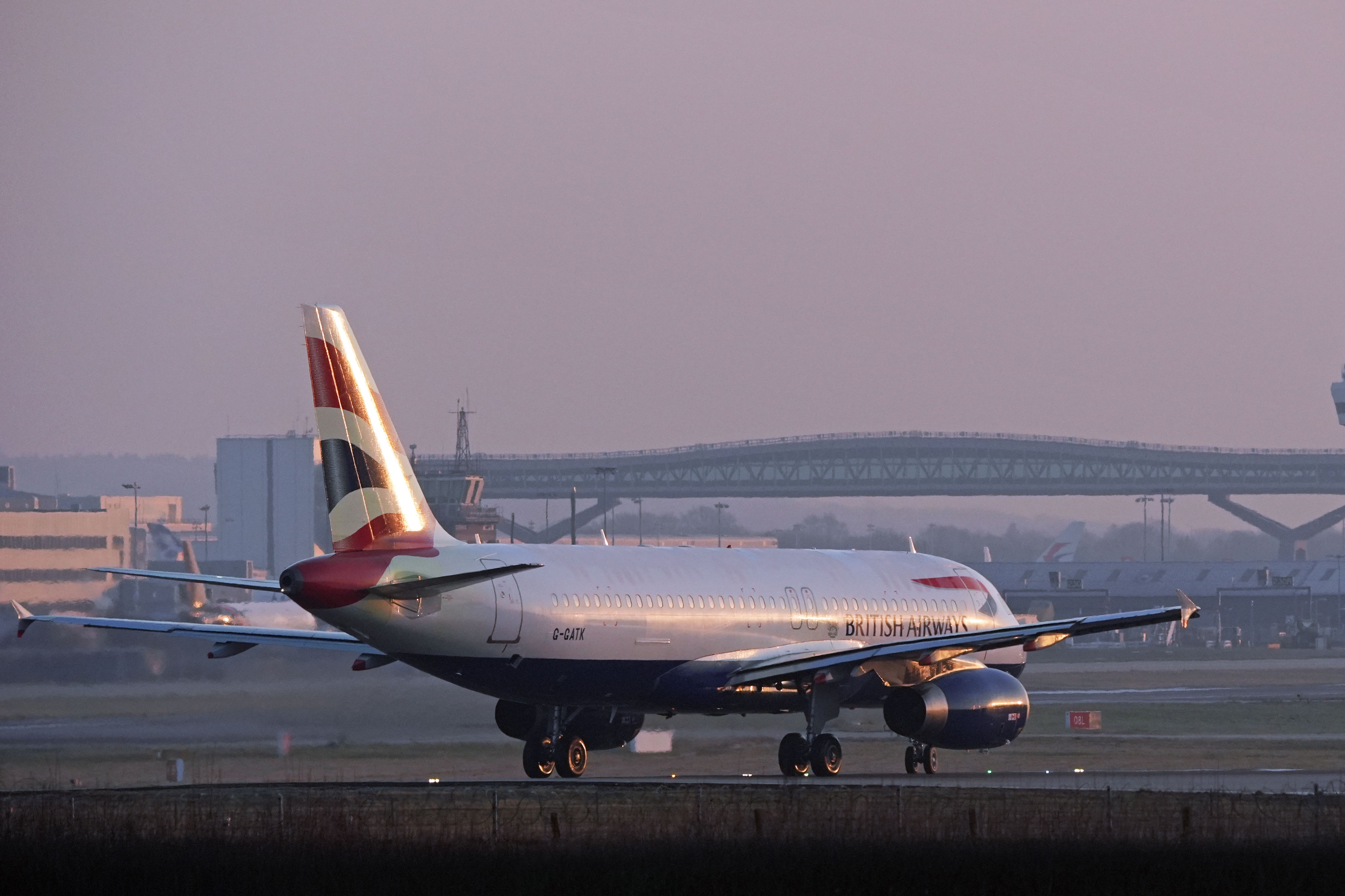 A British Airways plane taxis ahead of takeoff at Gatwick Airport