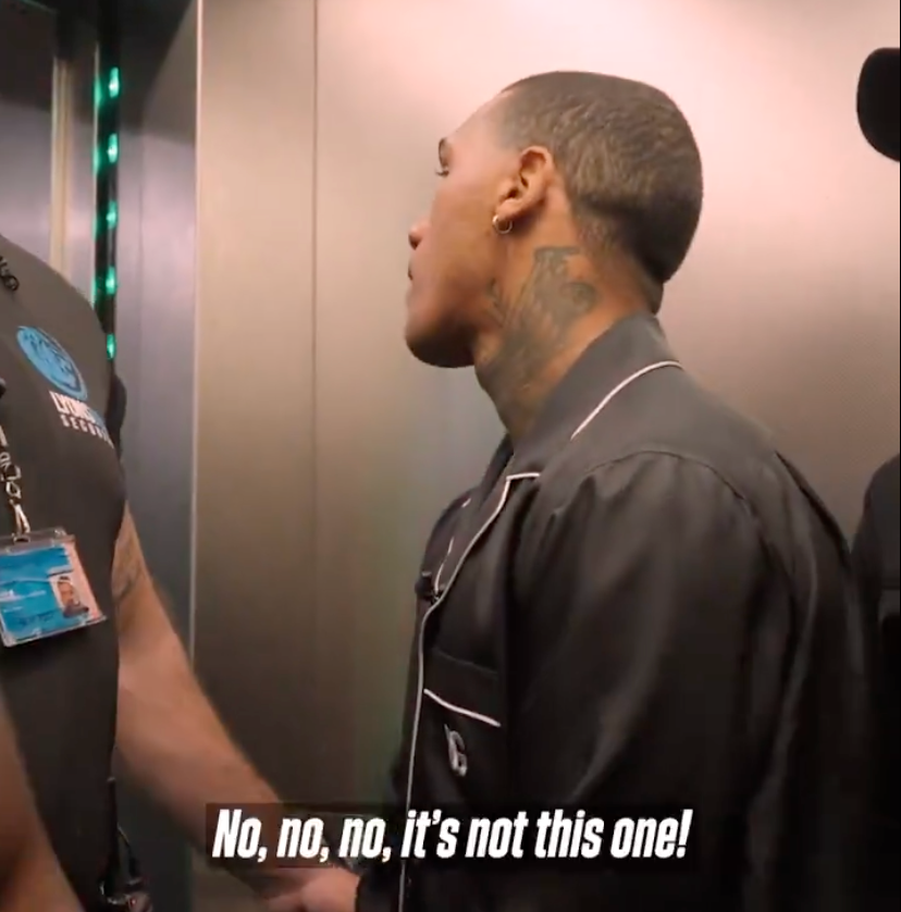 A security guard tells Conor Benn not to exit the lift