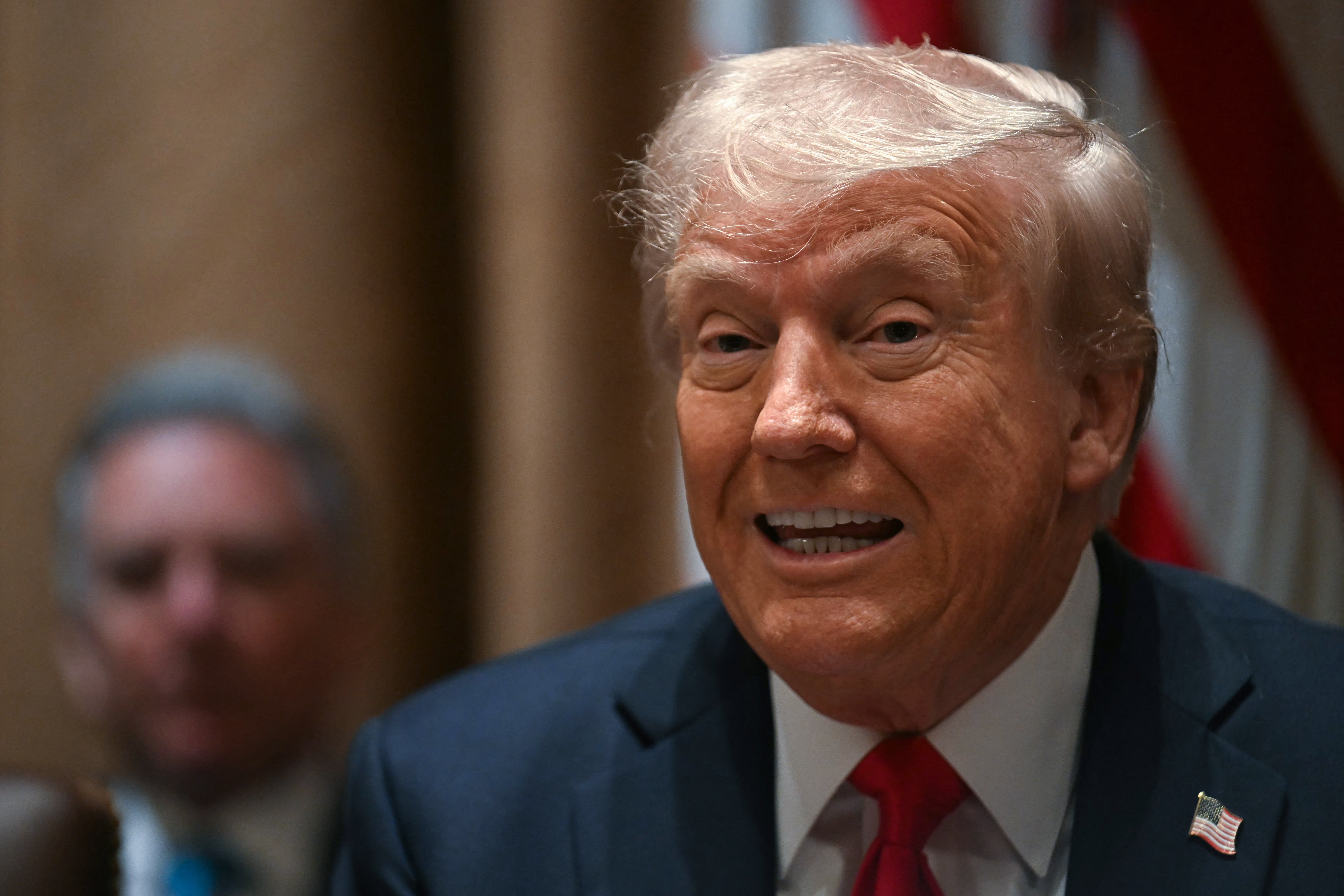 President Donald Trump tells a Fox News host at the end of his first Cabinet meeting to call it “unbelievable” on the air.