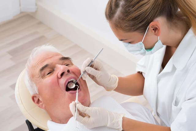 One of the most prevalent issues for the elderly is gum disease (Alamy/PA)