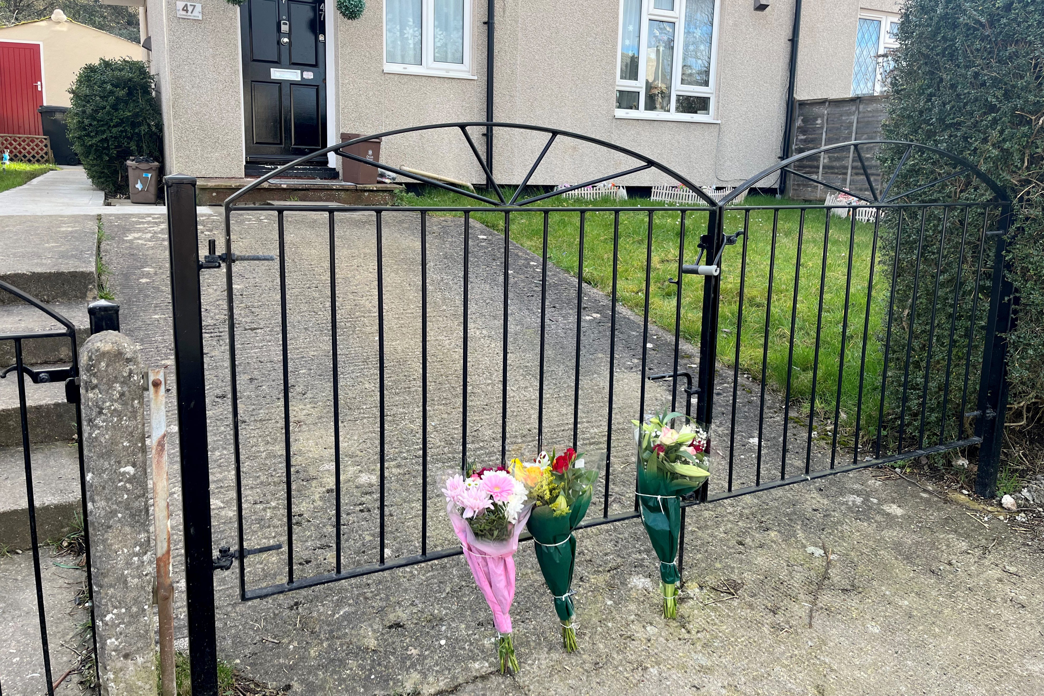 Floral tributes left near the scene on Cobhorn Drive in Bristol after a 19-year-old woman died after she was attacked by a dog (Rod Minchin/PA)