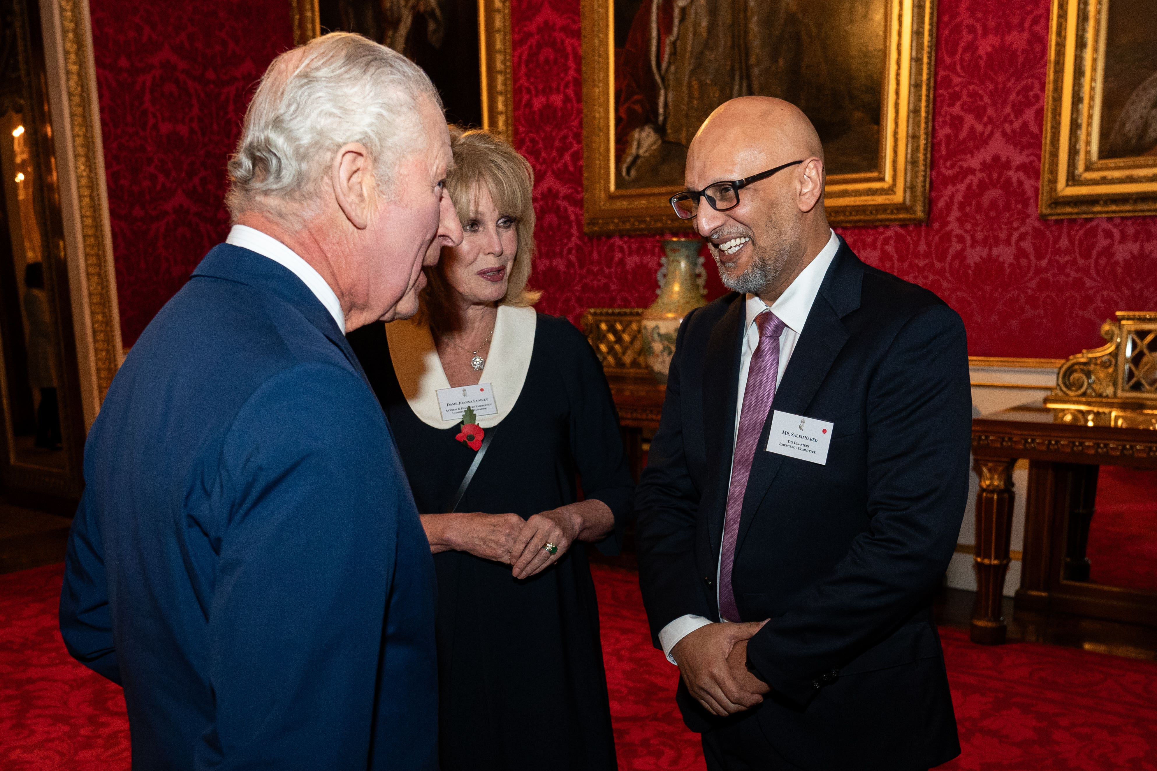 King Charles (left) with Joanna Lumley and Saleh Saeed from The Disasters Emergency Committee during a reception at Buckingham Palace, central London to recognise the UK’s contribution to humanitarian efforts across the world and to mark 60 years of the Disasters Emergency Committee (Aaron Chown/PA)