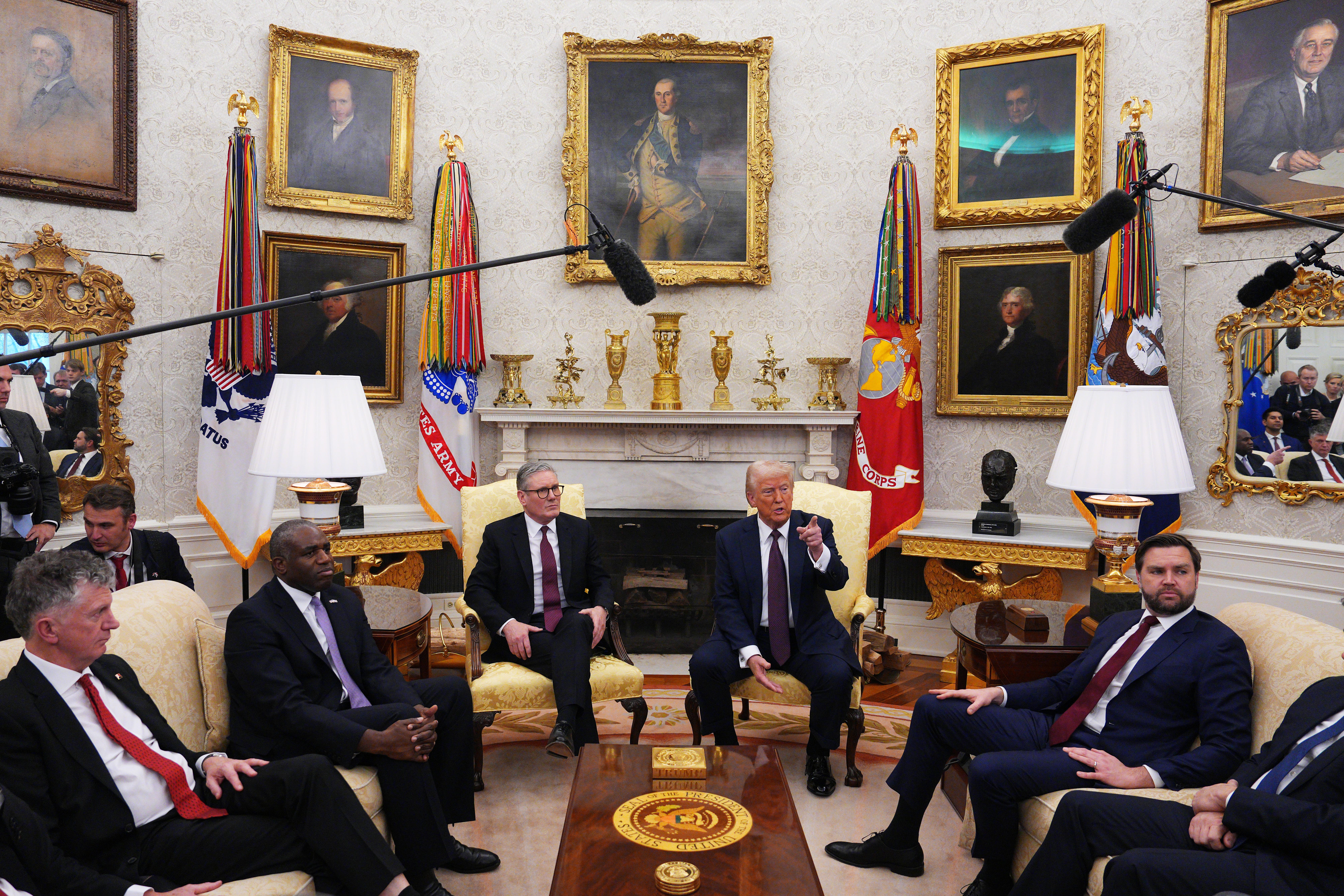 US President Donald Trump meeting Prime Minister Sir Keir Starmer, alongside US Vice President JD Vance and Foreign Secretary David Lammy, in the Oval Office (Carl Court/PA)