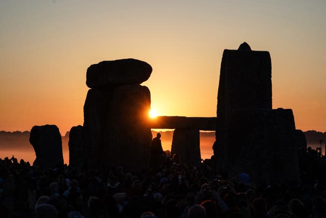 <p>Sun rises at Stonehenge, near Amesbury, in Wiltshire</p>