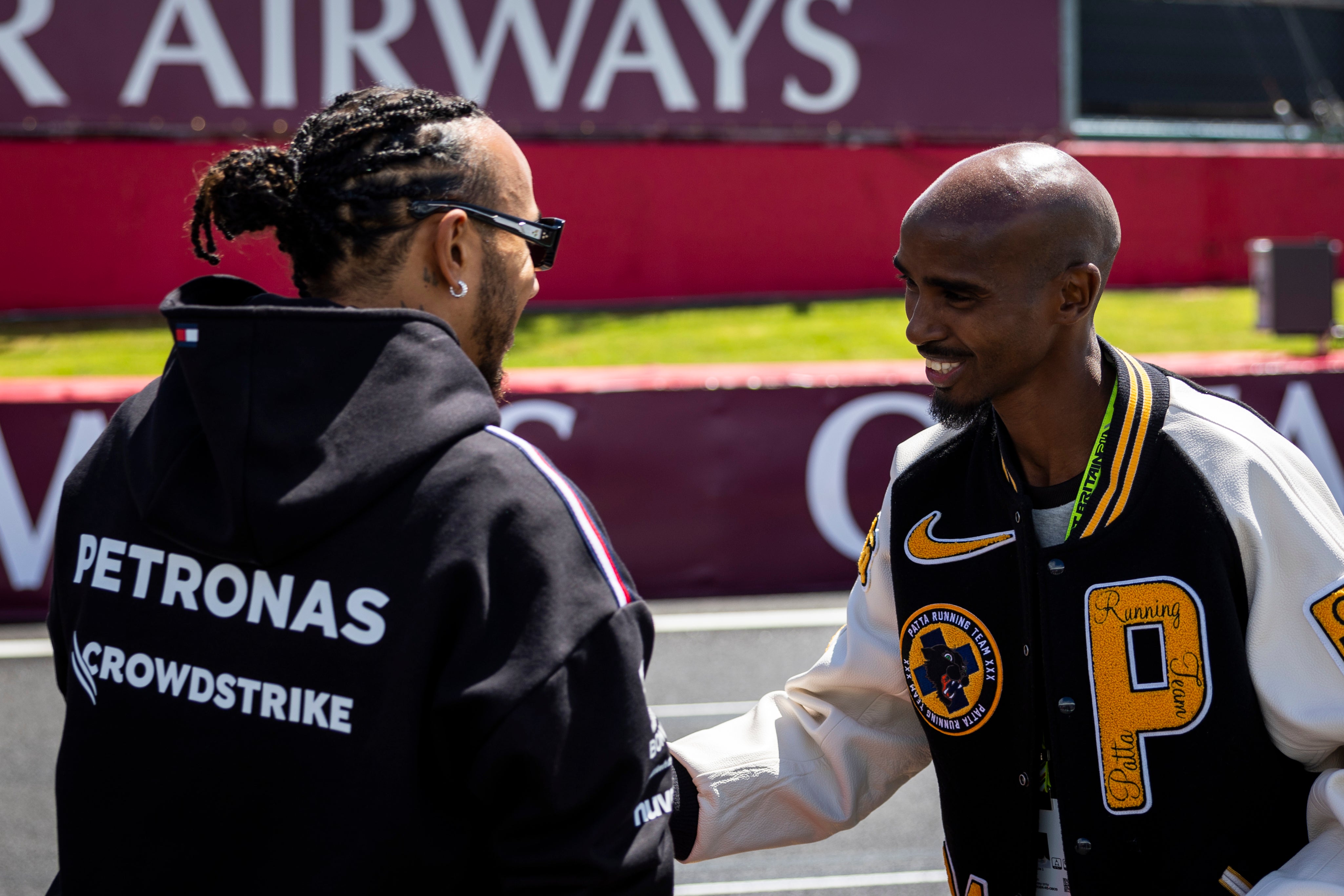 Lewis Hamilton and Sir Mo Farah at Silverstone last year