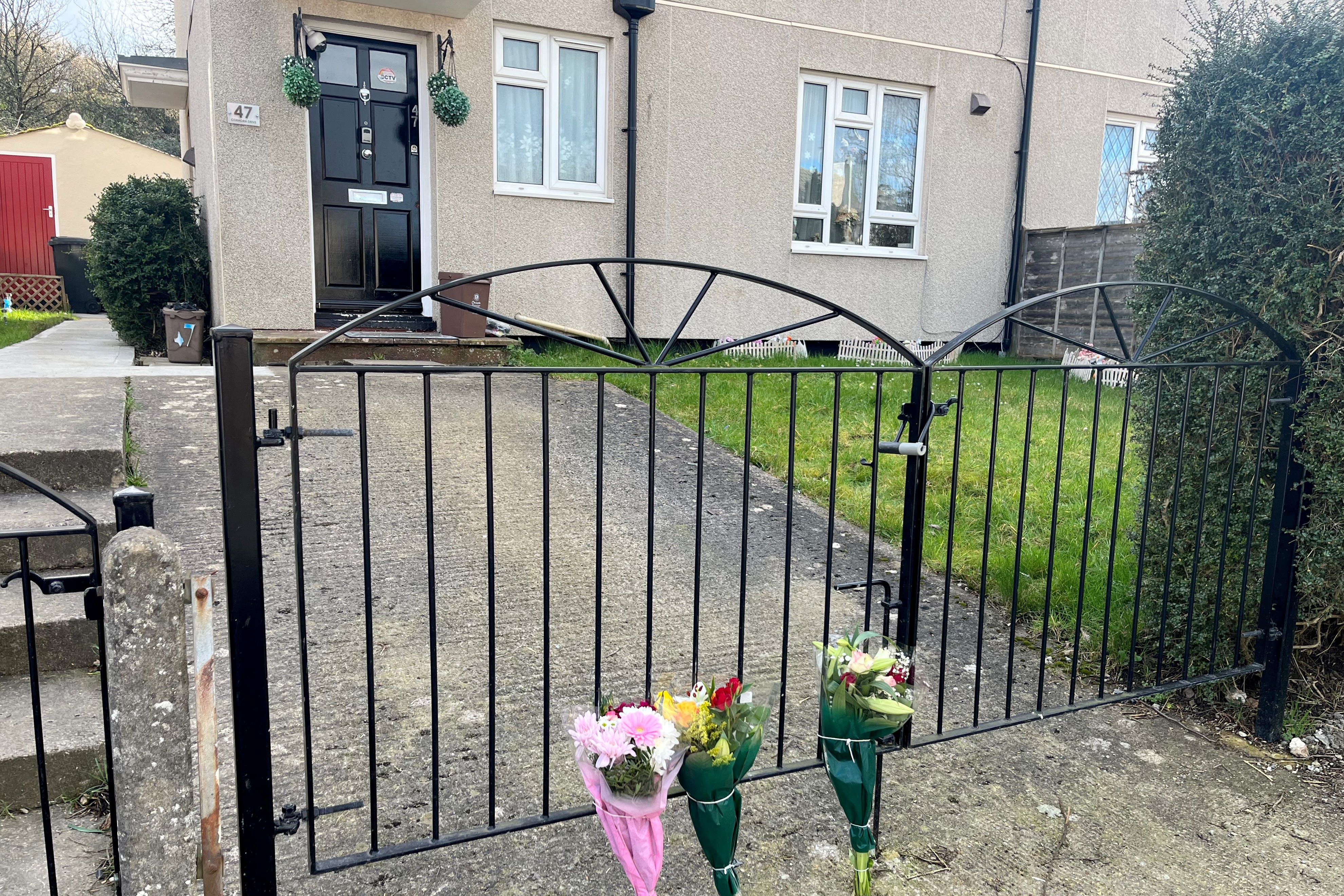 Floral tributes left near the scene on Cobhorn Drive, Hartcliffe, Bristol, where a 19-year-old woman died after she was attacked by a dog on Wednesday night (Rod Minchin/PA)