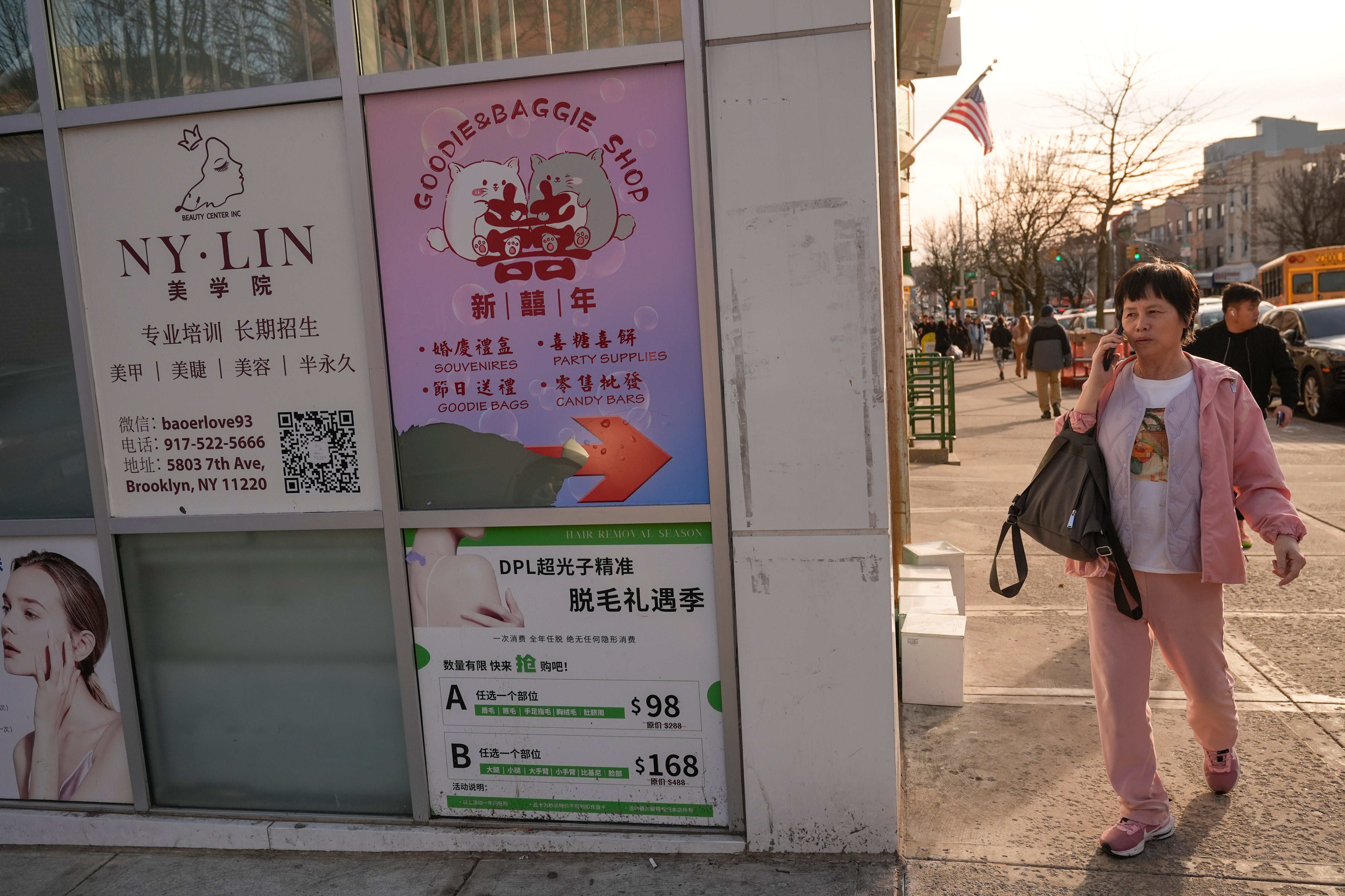 Signs in Chinese and English are displayed in Brooklyn