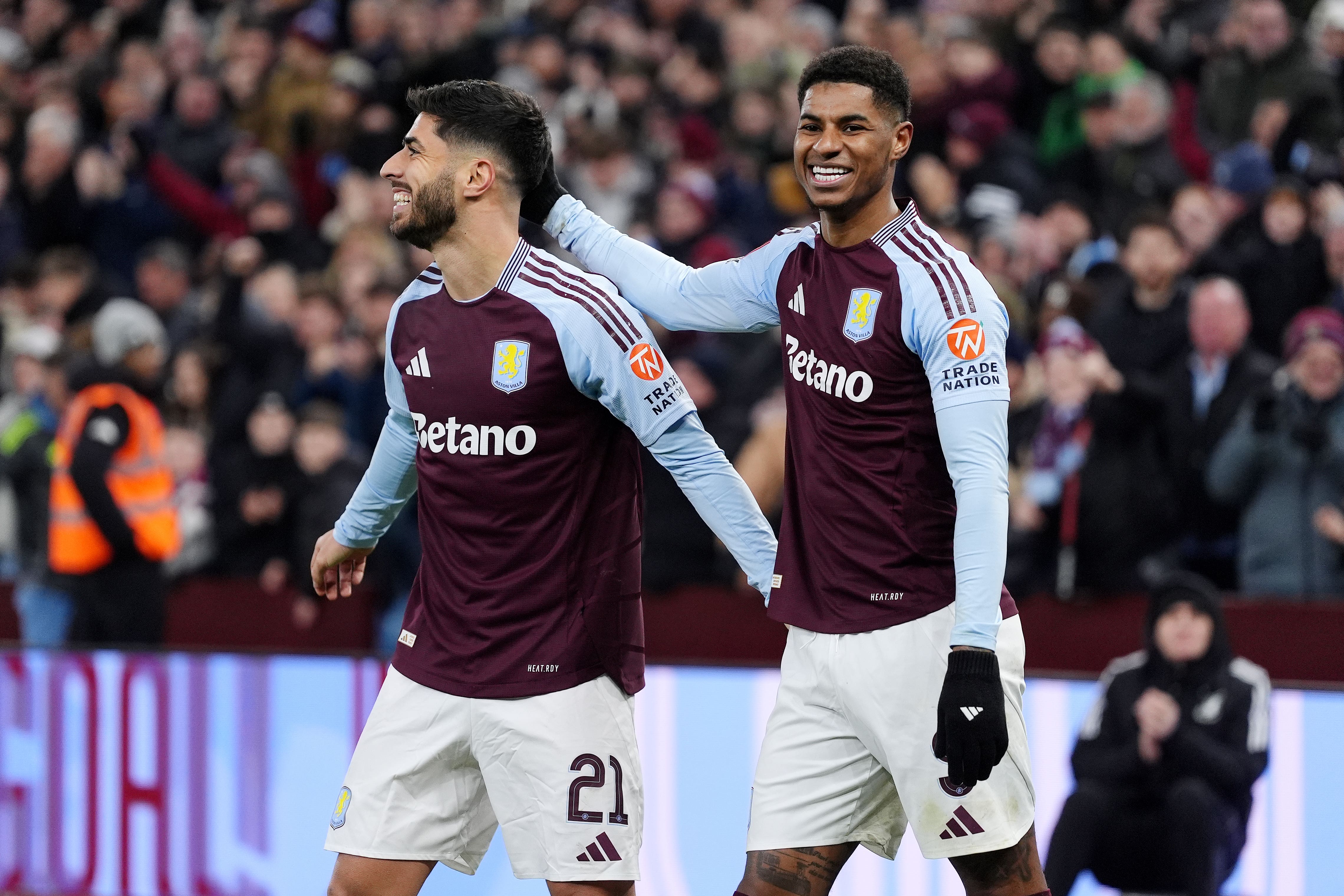 Aston Villa’s Marco Asensio celebrates with Marcus Rashford (Bradley Collyer/PA)