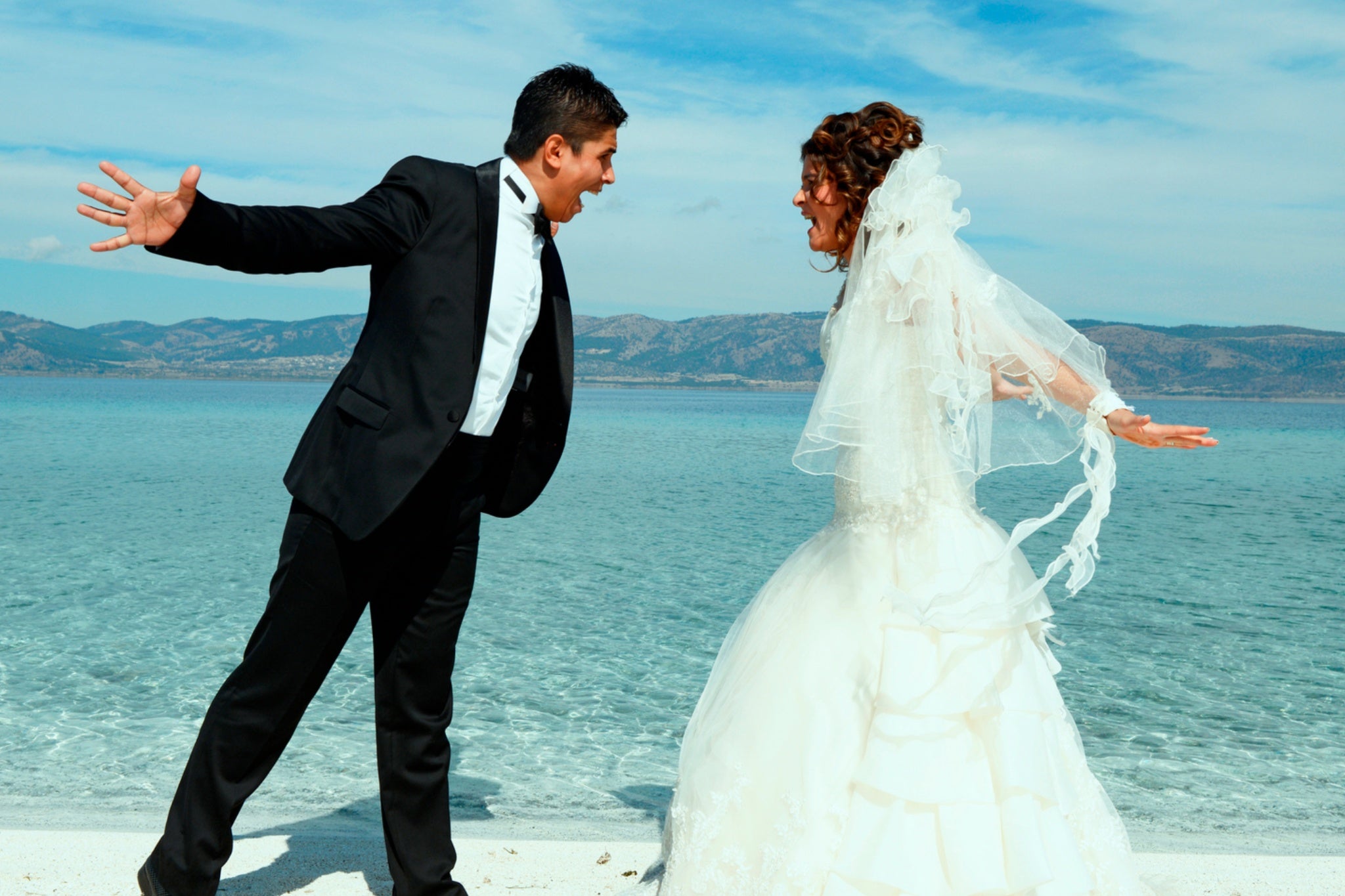 Bride gets mad at her husband after his parents plan to crash their honeymoon