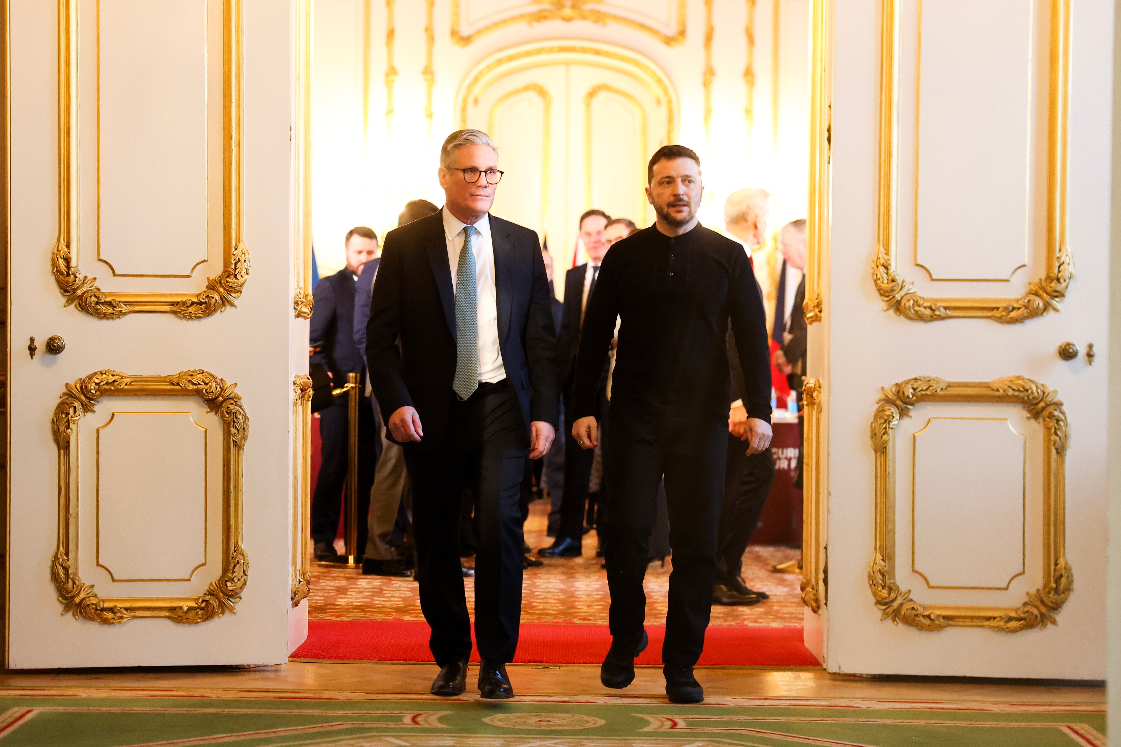 Sir Keir Starmer walks with President of Ukraine Volodymyr Zelenskyy as he hosts a European Leaders Summit at Lancaster House