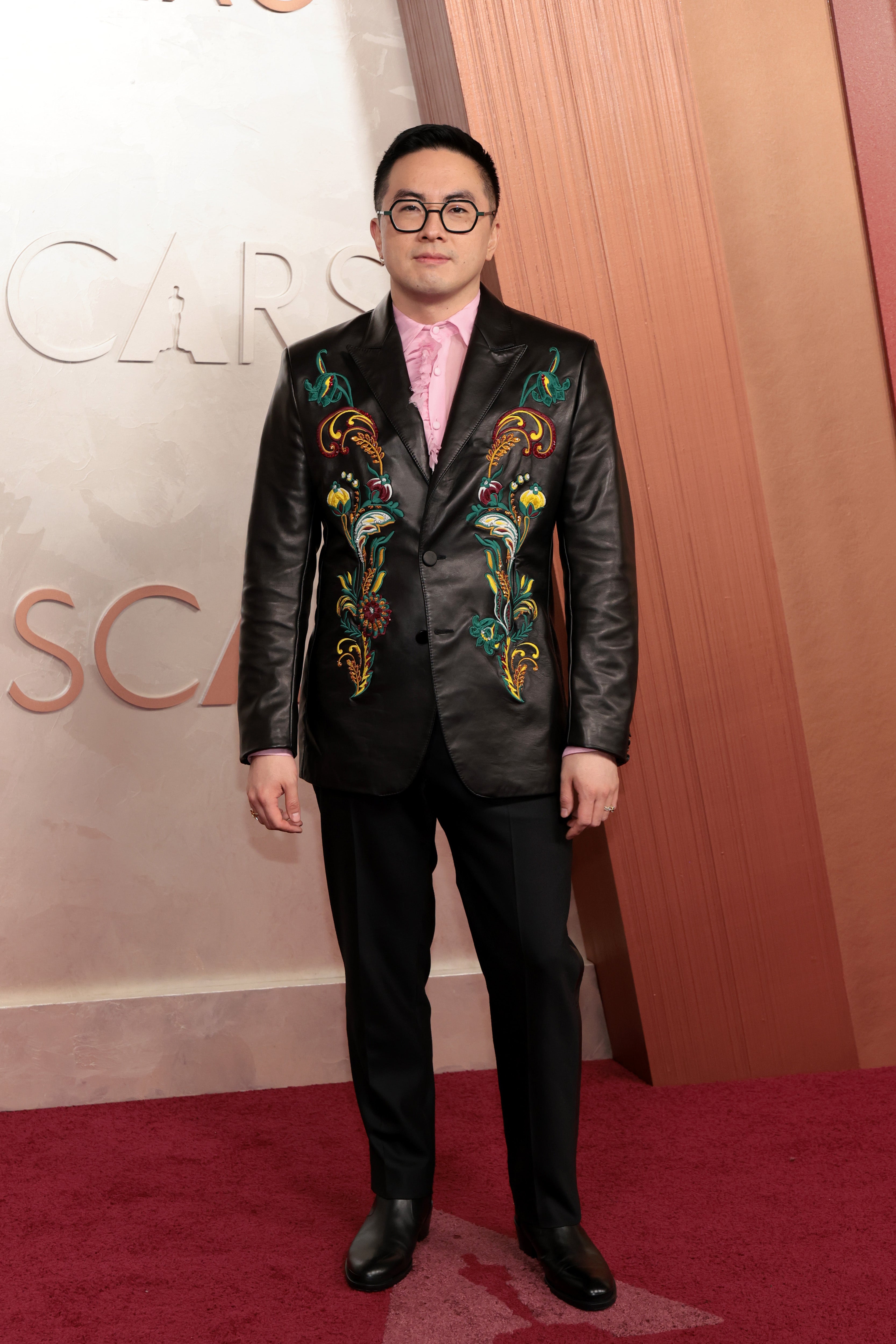 The ‘Saturday Night Live’ actor walked the Oscars red carpet wearing a suit jacket decked out in a floral pattern that looked a little too busy