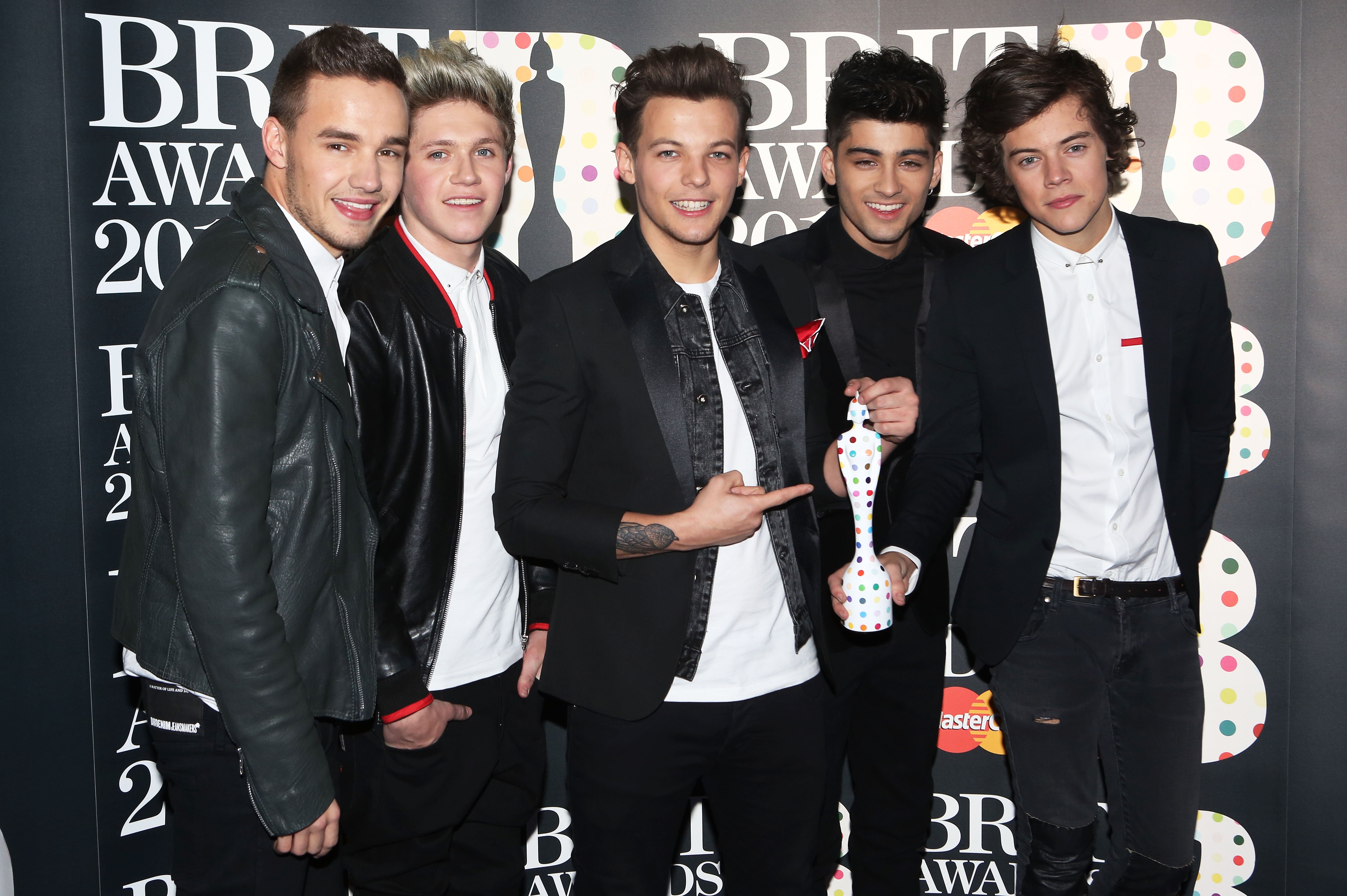(L-R) Liam Payne, Niall Horan, Louis Tomlinson, Zayn Malik and Harry Styles of One Direction at the Brit Awards 2013