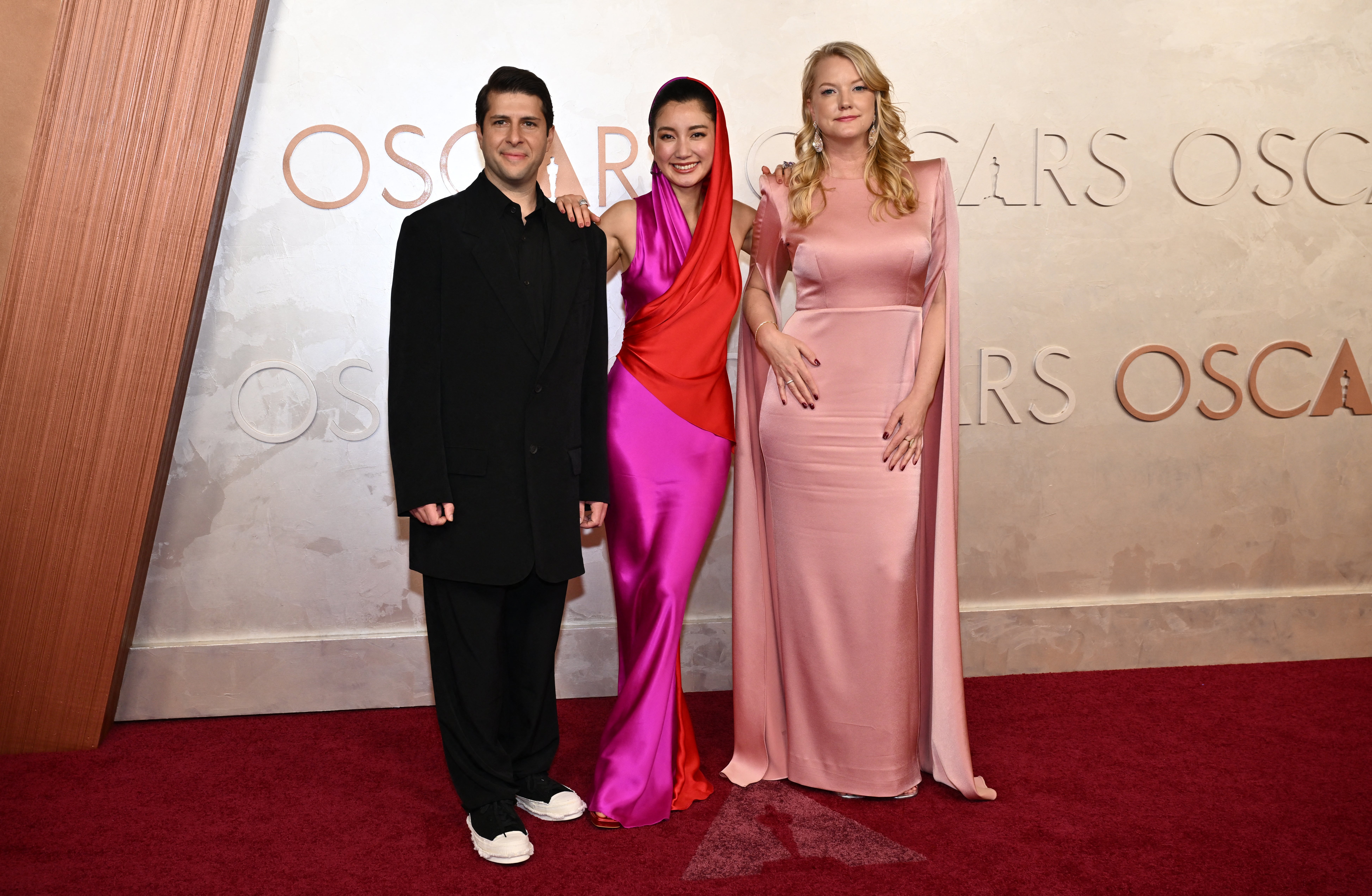 Japanese producer Eric Nyari, Japanese journalist and filmmaker Shiori Ito and Swedish filmmaker Hanna Aqvilin attend the 97th Annual Academy Awards