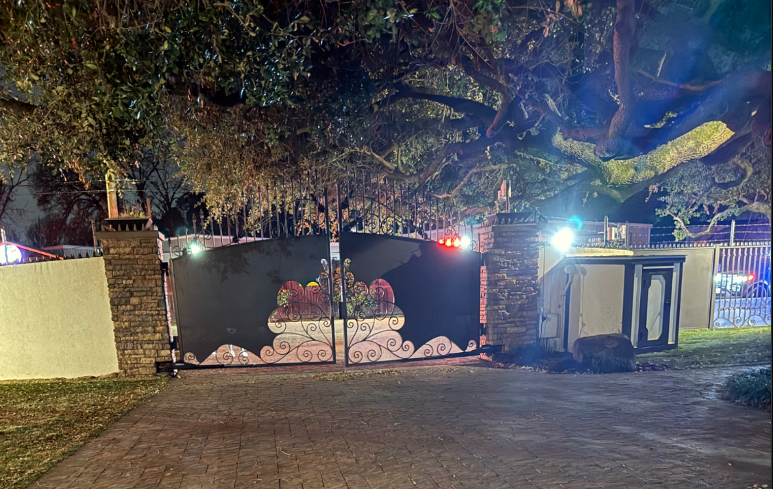 A photo posted to Amouranth's X account after the alleged robbery attempt, showing police vehicles at her Houston home