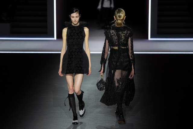 Models wears creations as part of the Dior Fall/Winter 2025-2026 Womenswear collection presented Tuesday, March 4, 2025. in Paris. (Photo by Scott A Garfitt/Invision/AP)