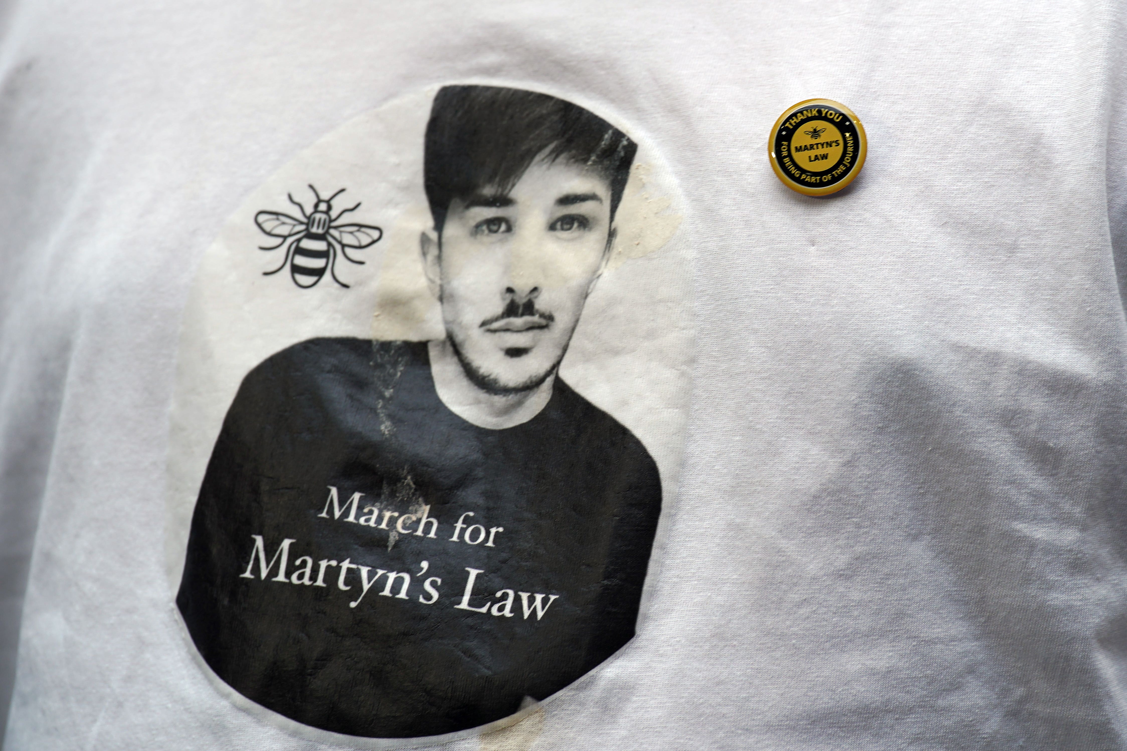 The image of Martyn Hett, a victim of the Manchester Arena bombing, on a T-shirt (Peter Byrne/PA)