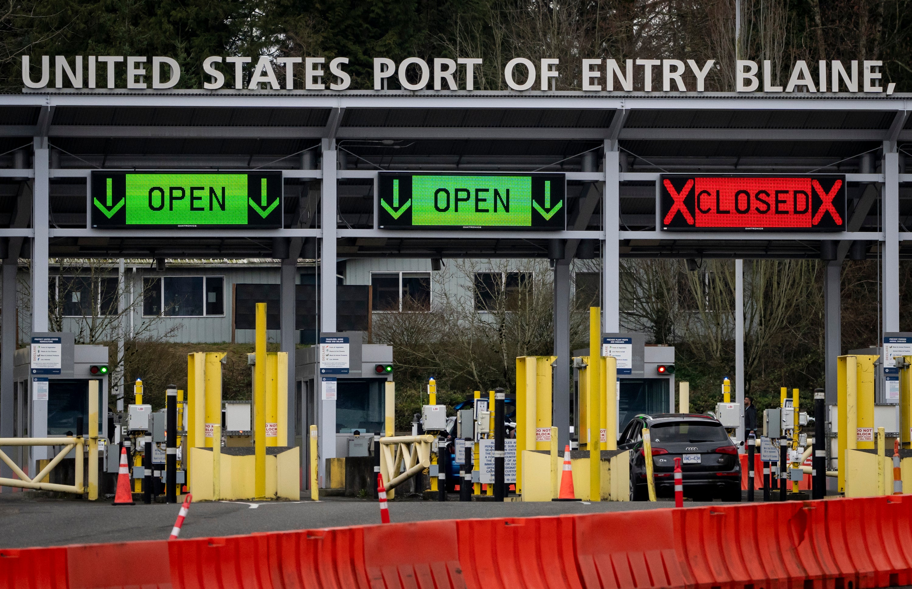 A car waits at the United States and Canada border