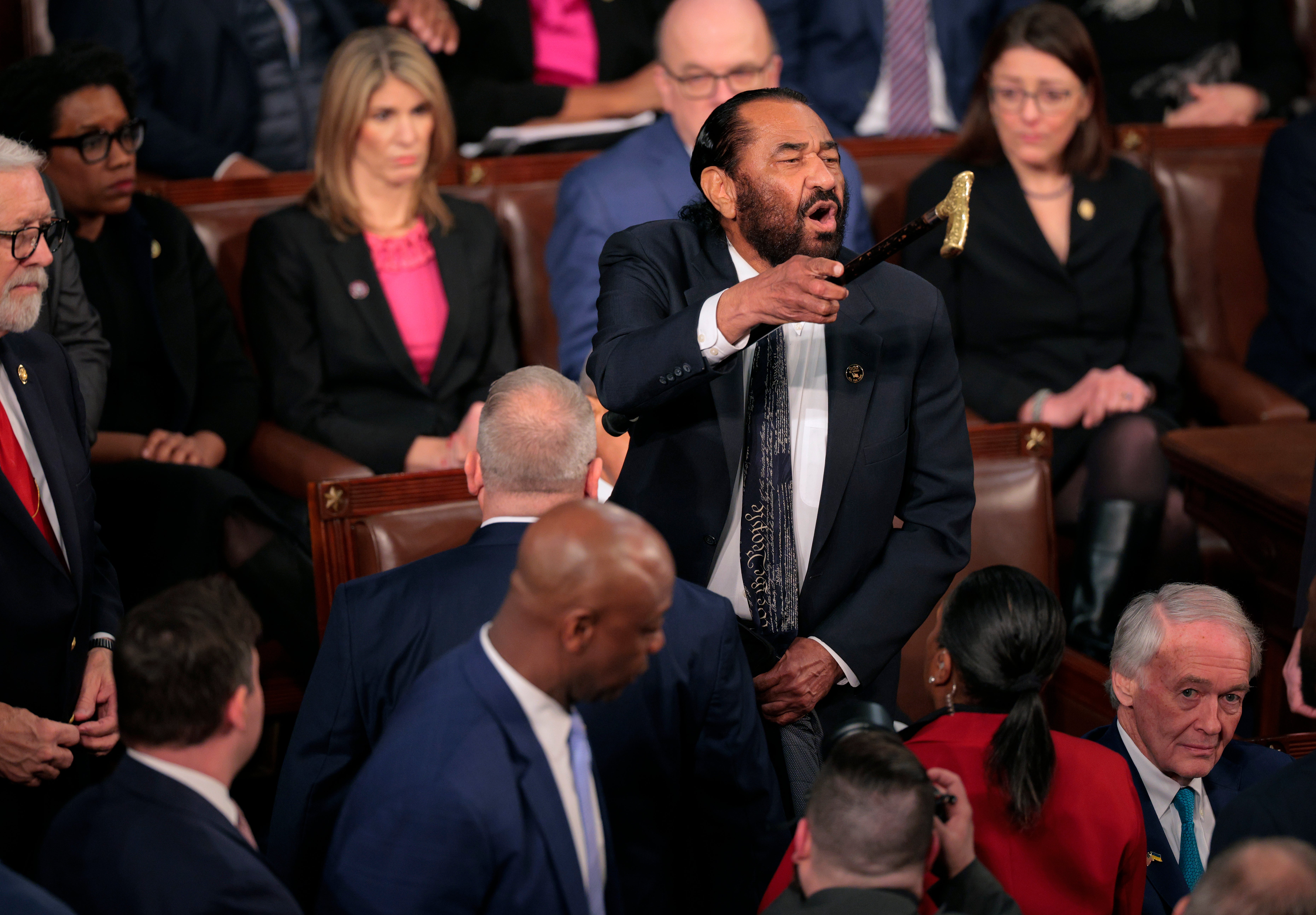 Rep. Al Green (D-TX) shouts out as U.S. President Donald Trump addresses a joint session of Congress at the U.S. Capitol on March 04