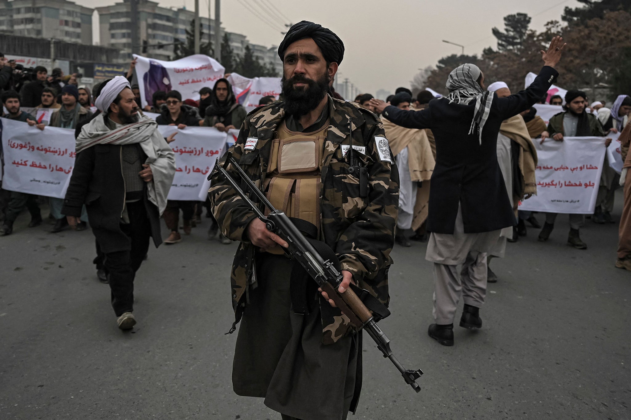 A Taliban fighter pictured at a protest held by women’s rights activists in 2022