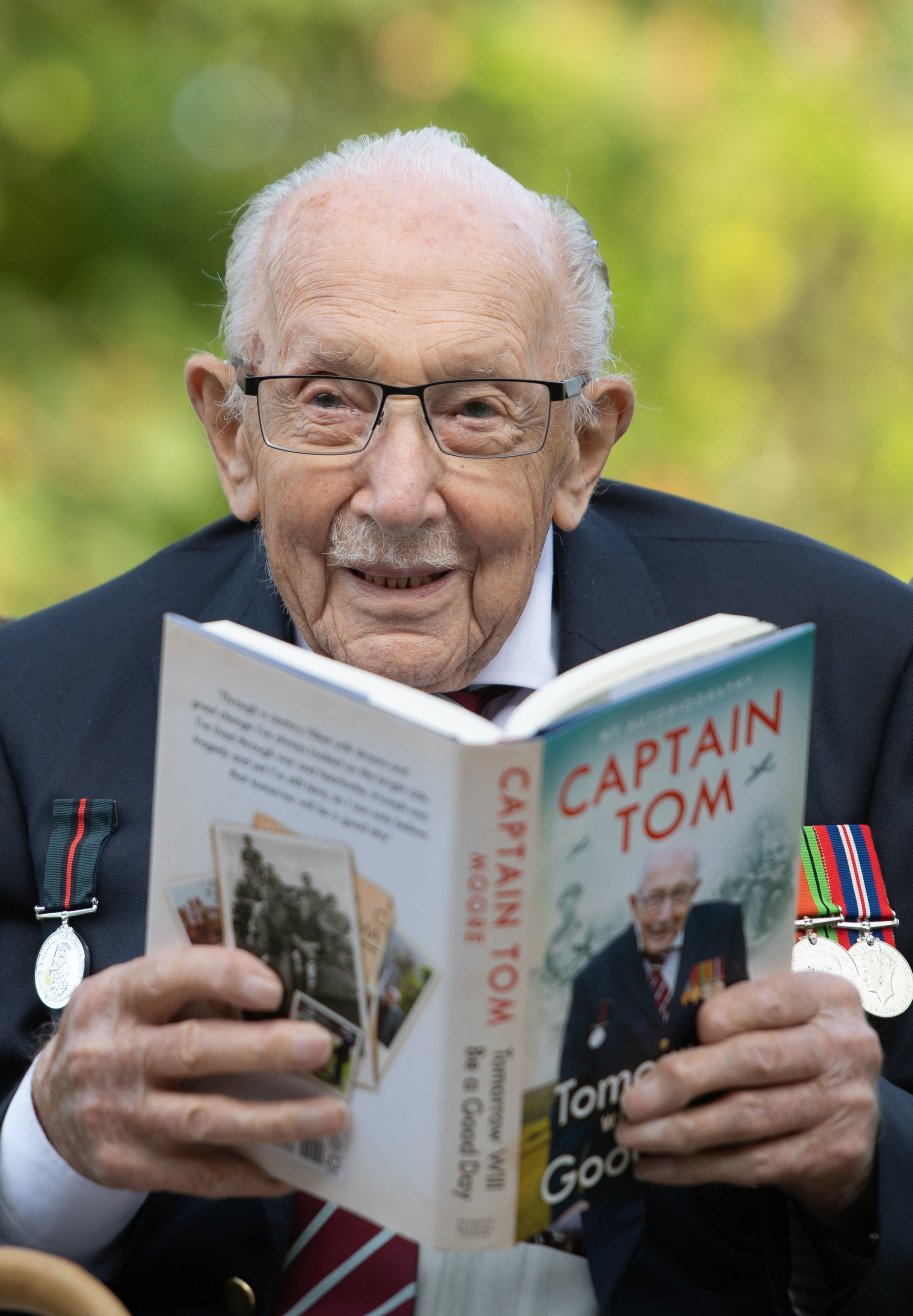 Captain Sir Tom Moore with his book Tomorrow Will Be A Good Day