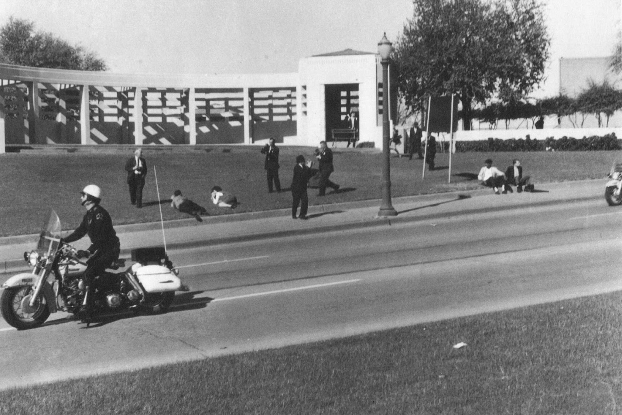 It turned out that the umbrella man, sat on the far right side at the scene of the assassination, brought it with to heckle Kennedy
