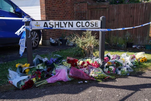 <p>Flowers left at the scene in Bushey, Hertfordshire (Jonathan Brady/ PA)</p>