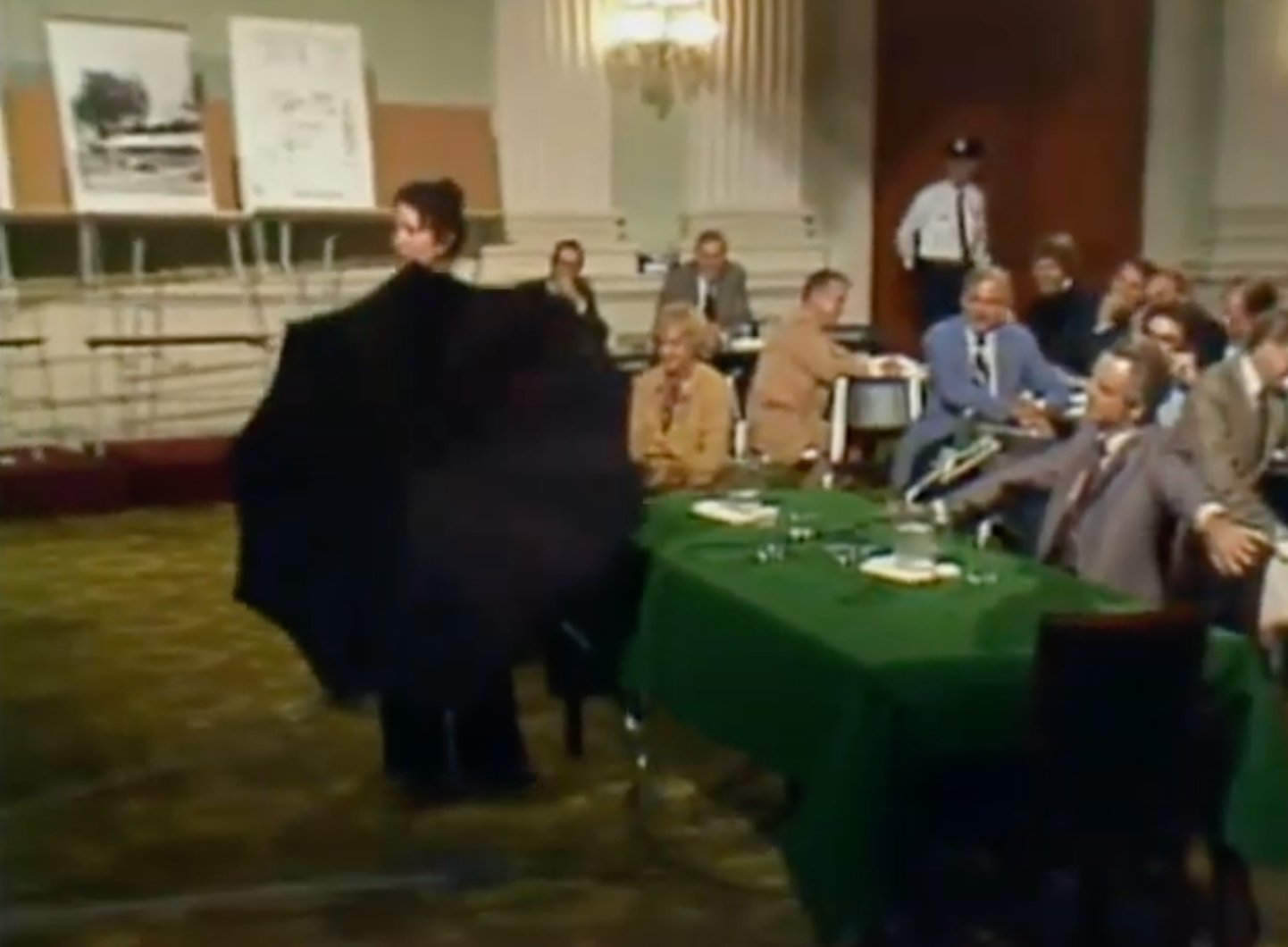 The umbrella, exhibit 405, is demonstrated to the House Select Committee on Assassinations in 1978