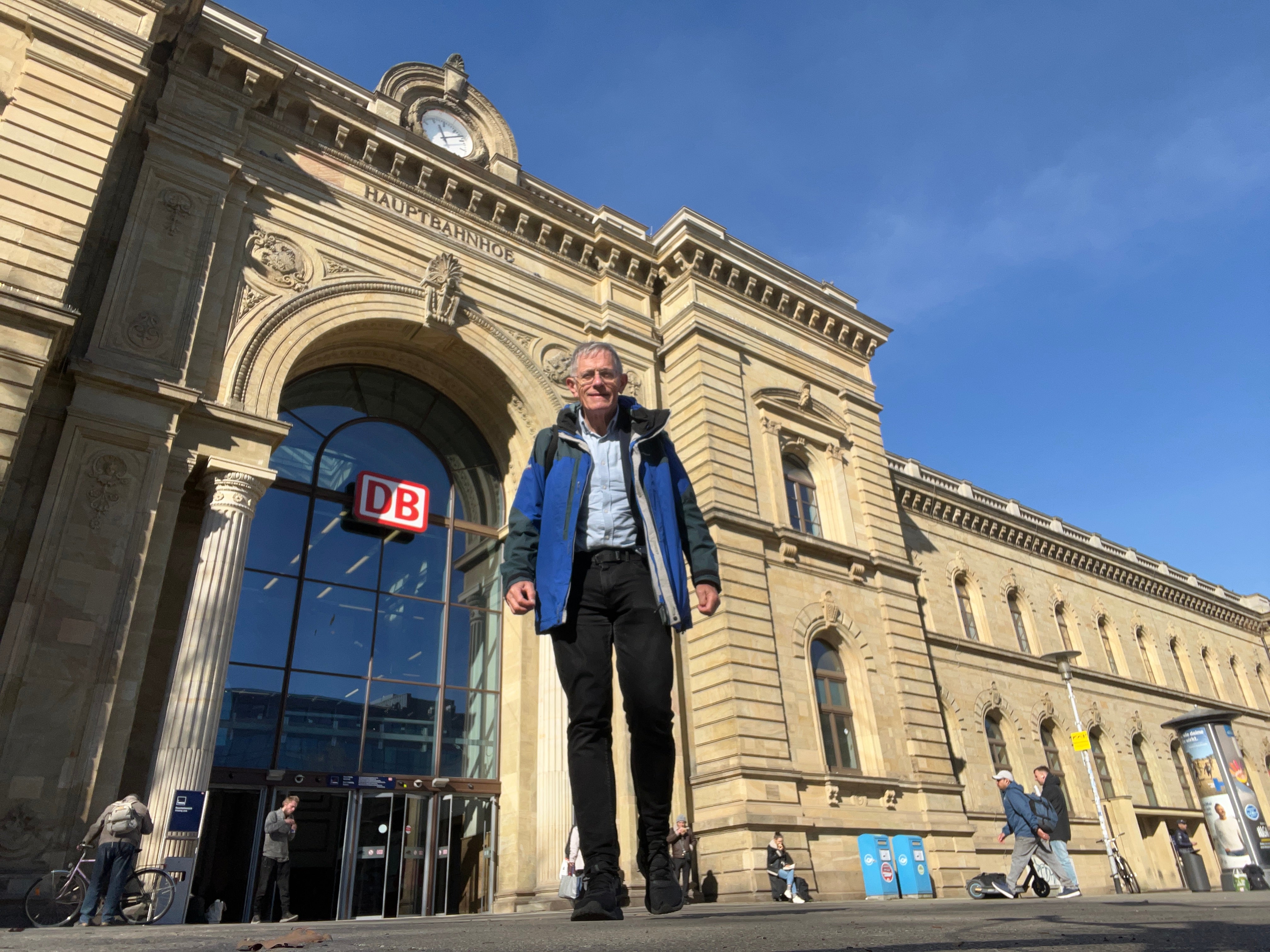 Cheap trick: Simon Calder at Magdeburg station in Germany, as part of his £48 rail trek