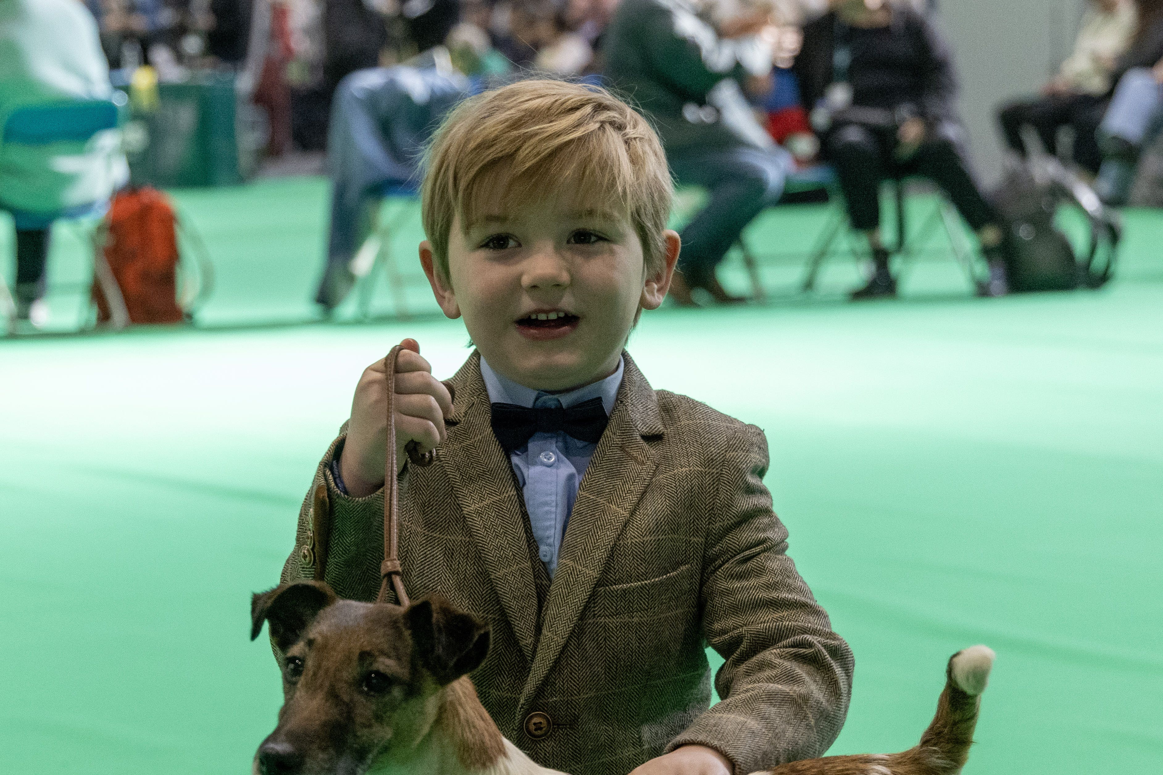 Six-year-old Crufts winner Freddie with his smooth fox terrier Penny (BeatMedia/The Royal Kennel Club/PA)